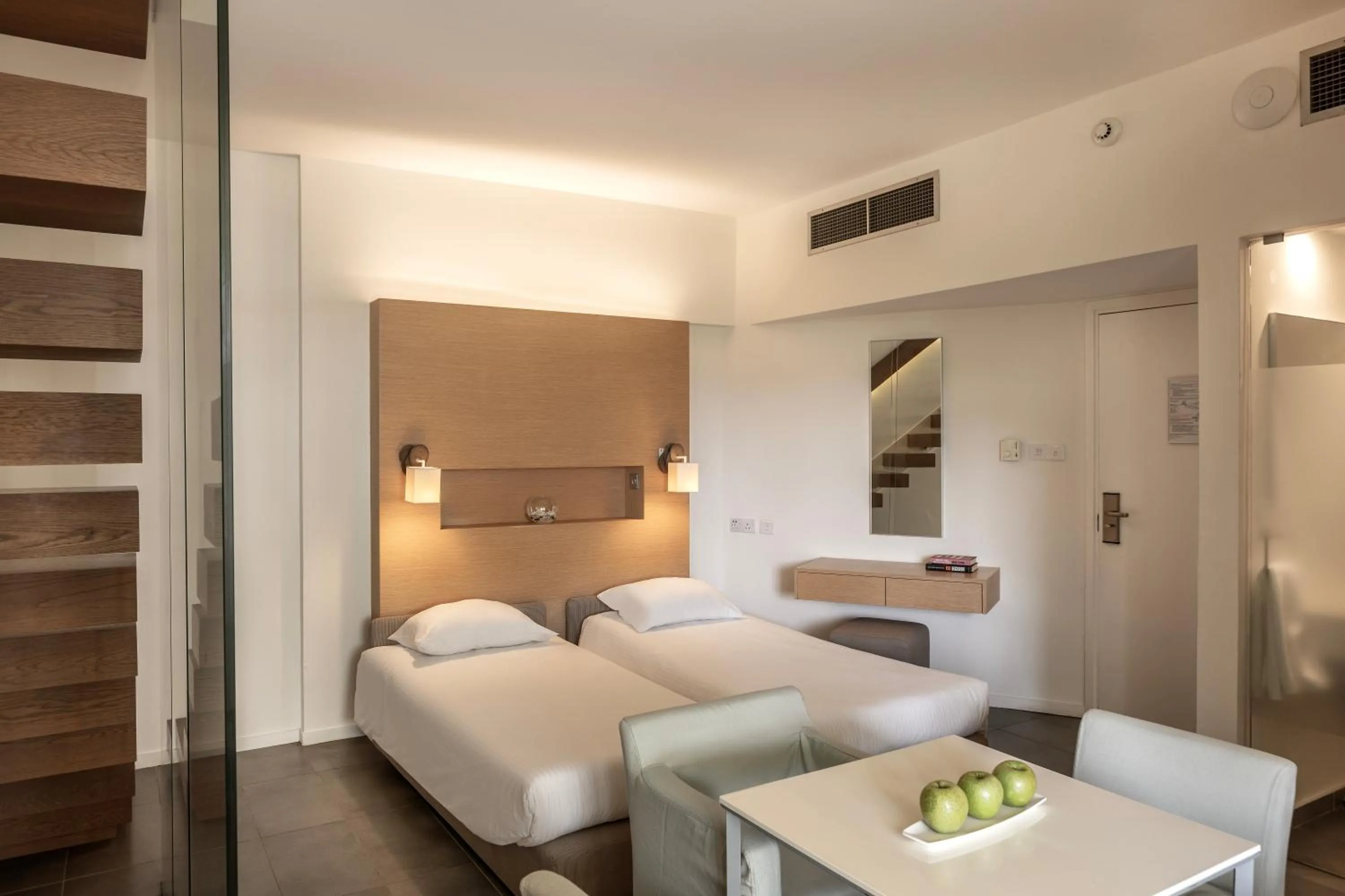 Bed in Capo Bay Hotel