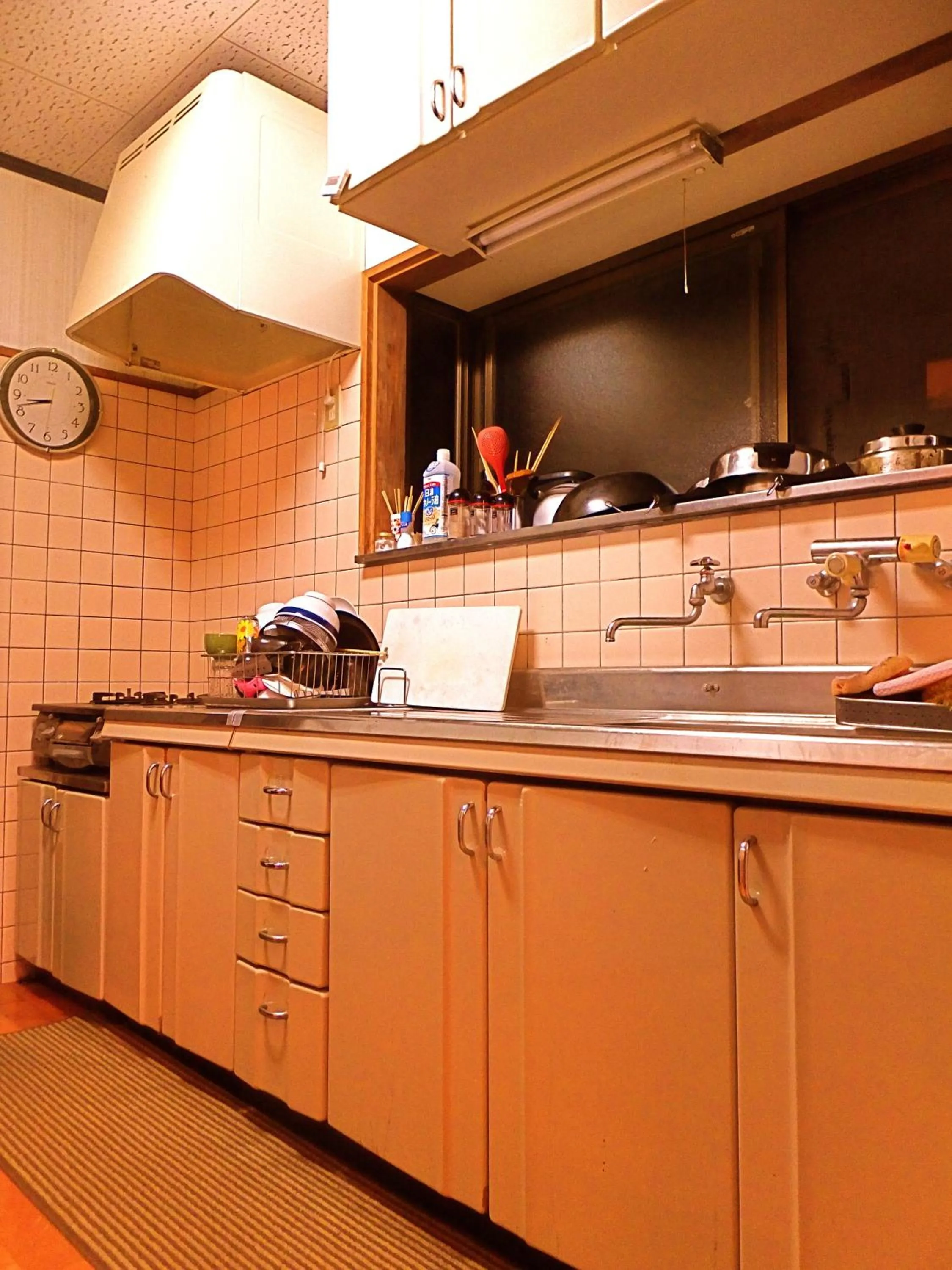 Kitchen or kitchenette in Aoshima Guesthouse Hooju