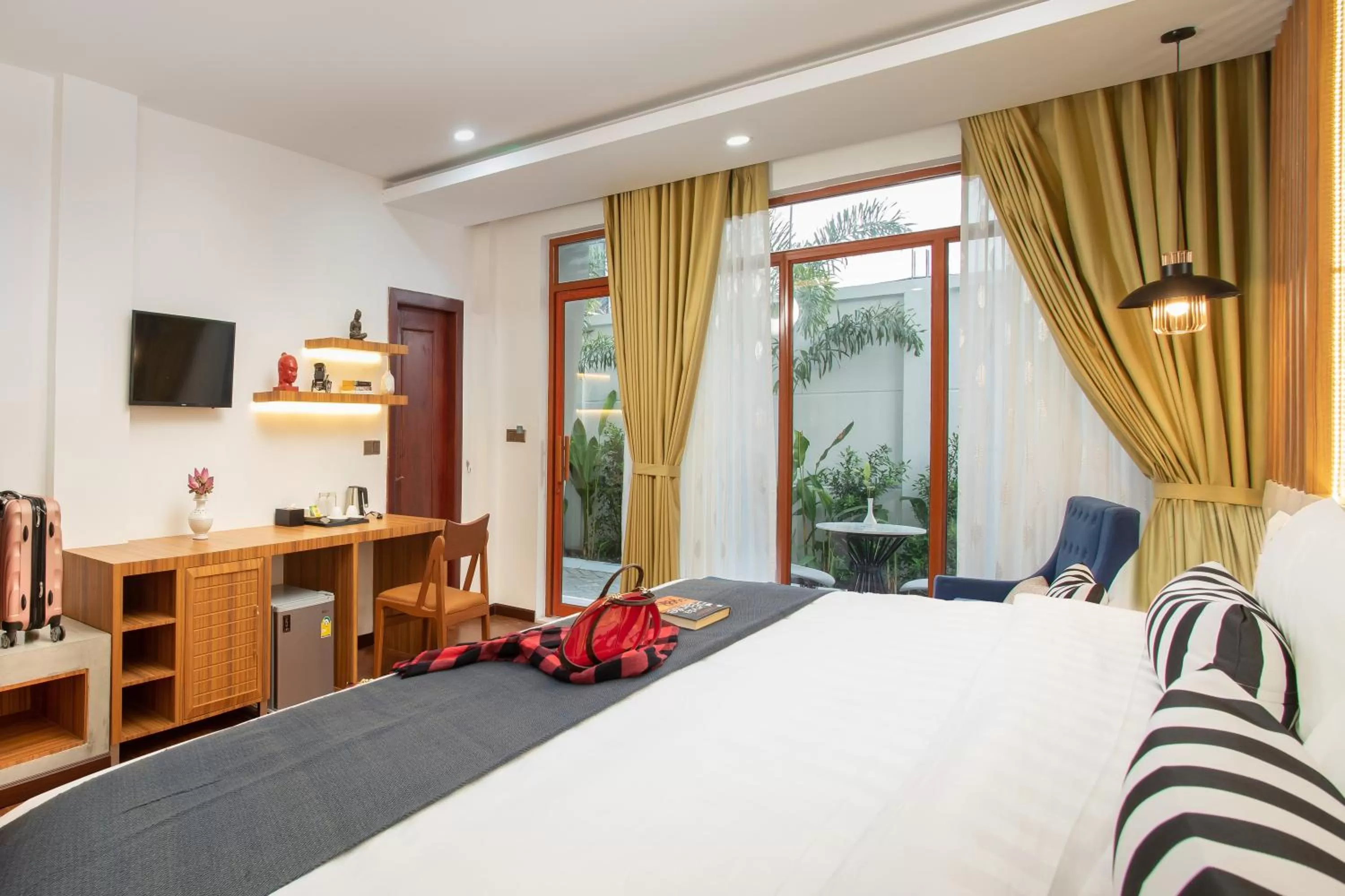 Bedroom in Cambana La Riviere Boutique