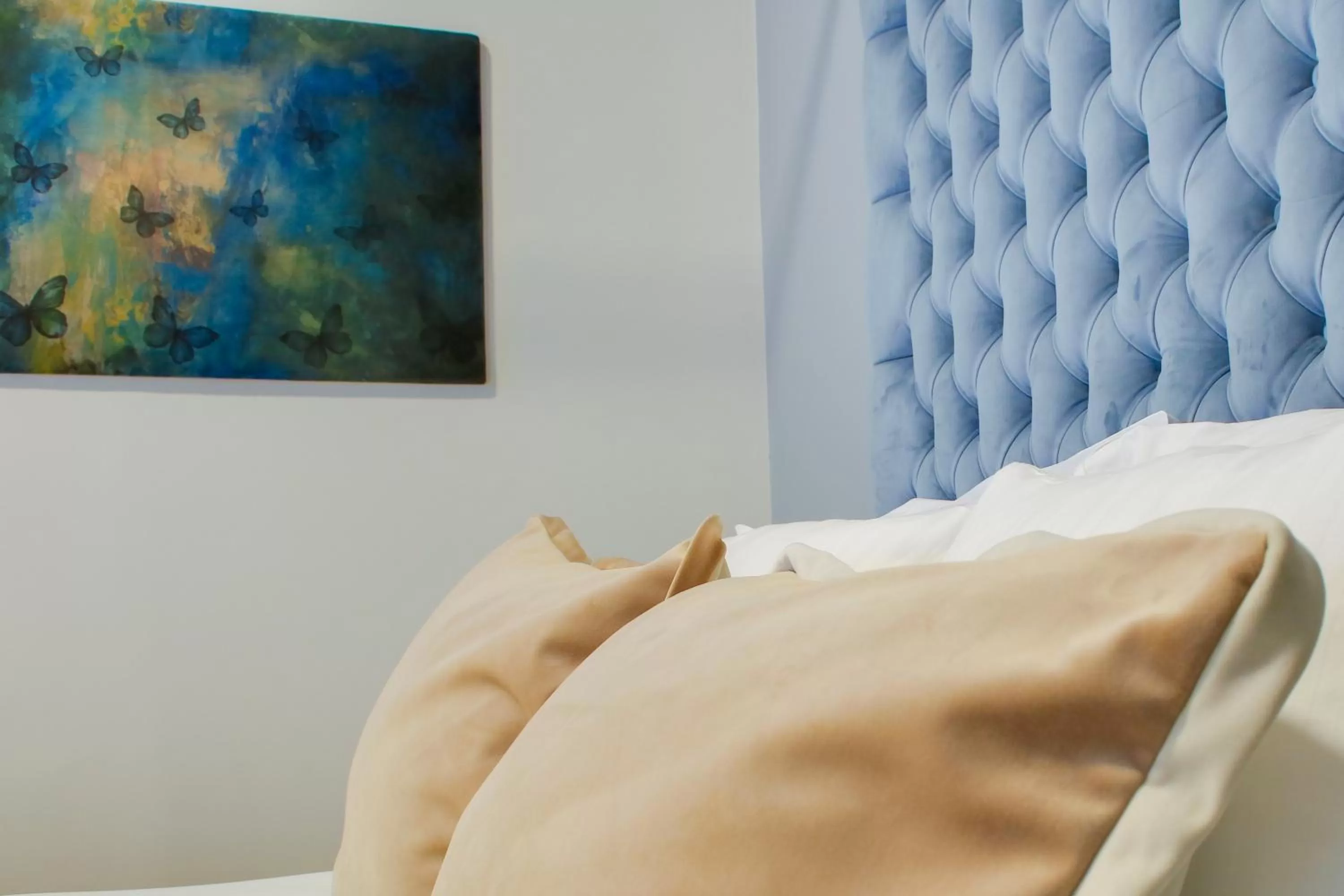 Bed in AthINN Residence