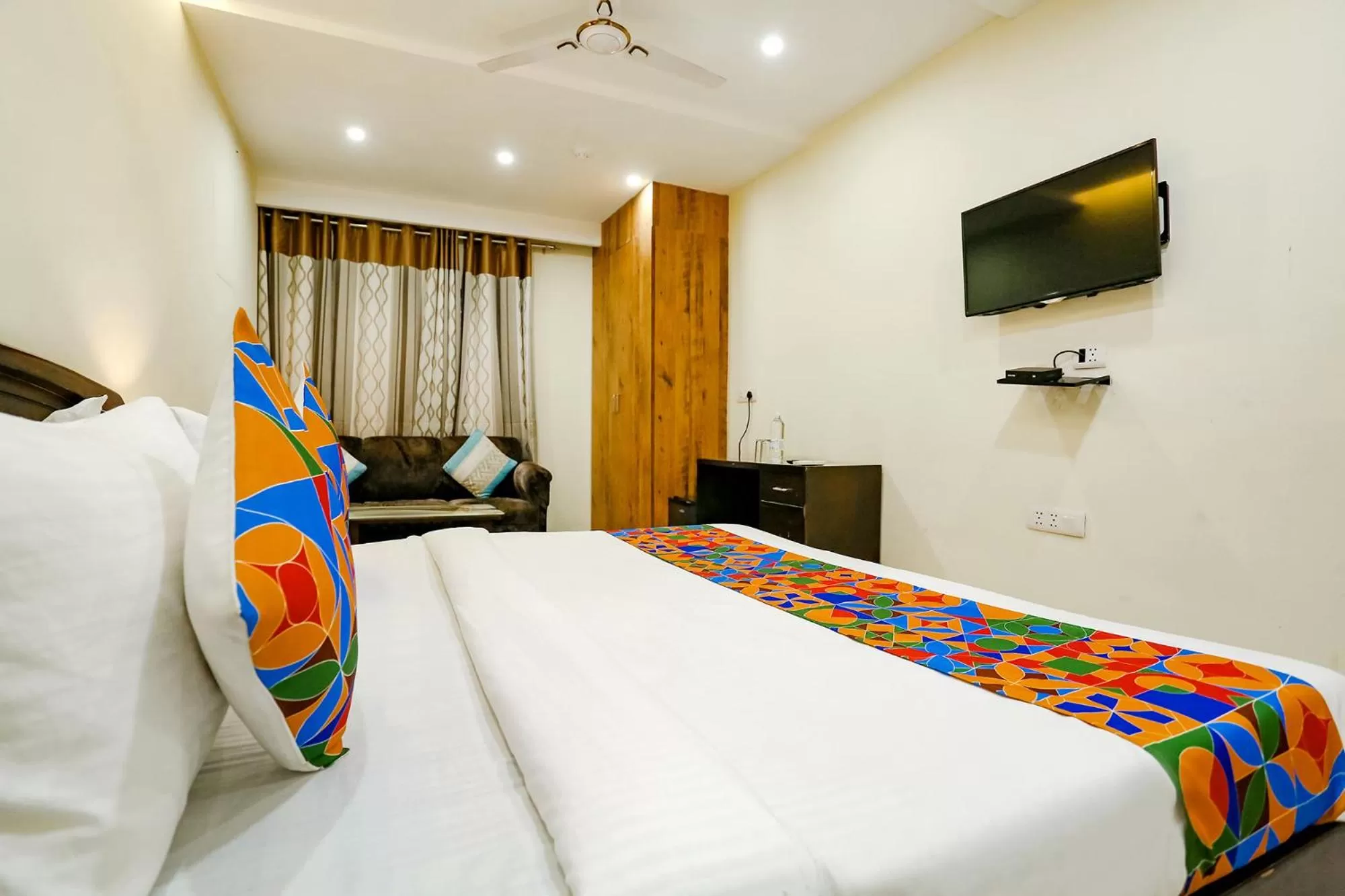 Communal lounge/ TV room, Bed in FabHotel F9 NSP - Near Pacific Mall Pitampura