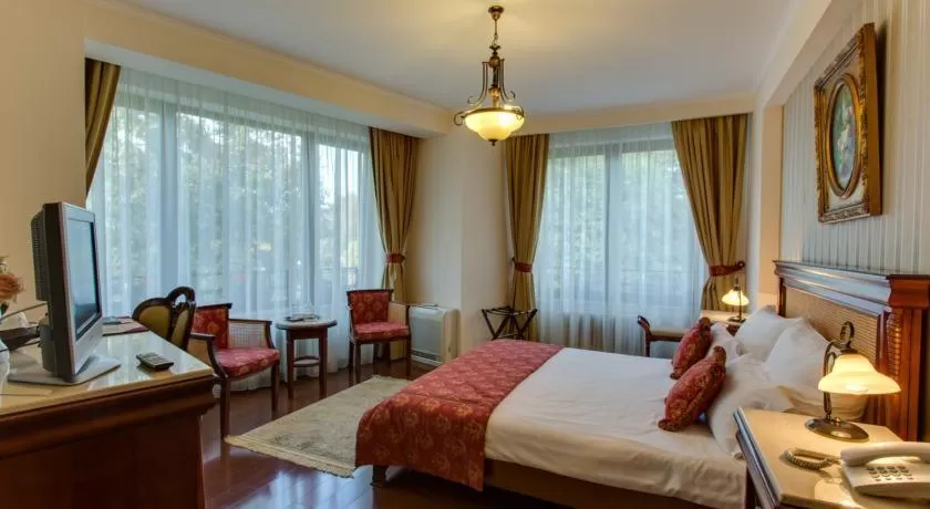 Bed in Vila Paris Boutique Hotel