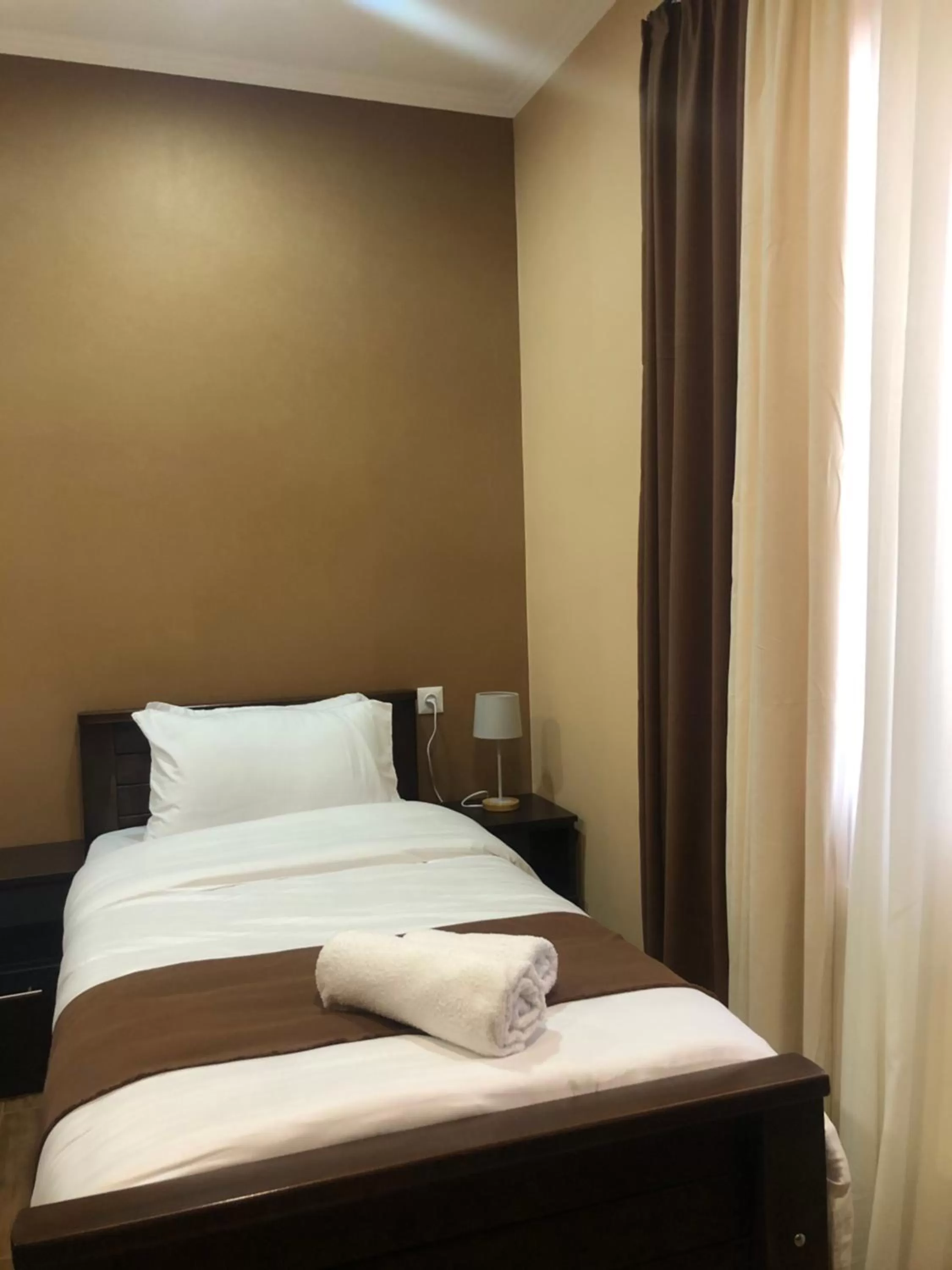 Bed in Borjomi Yellow Hotel