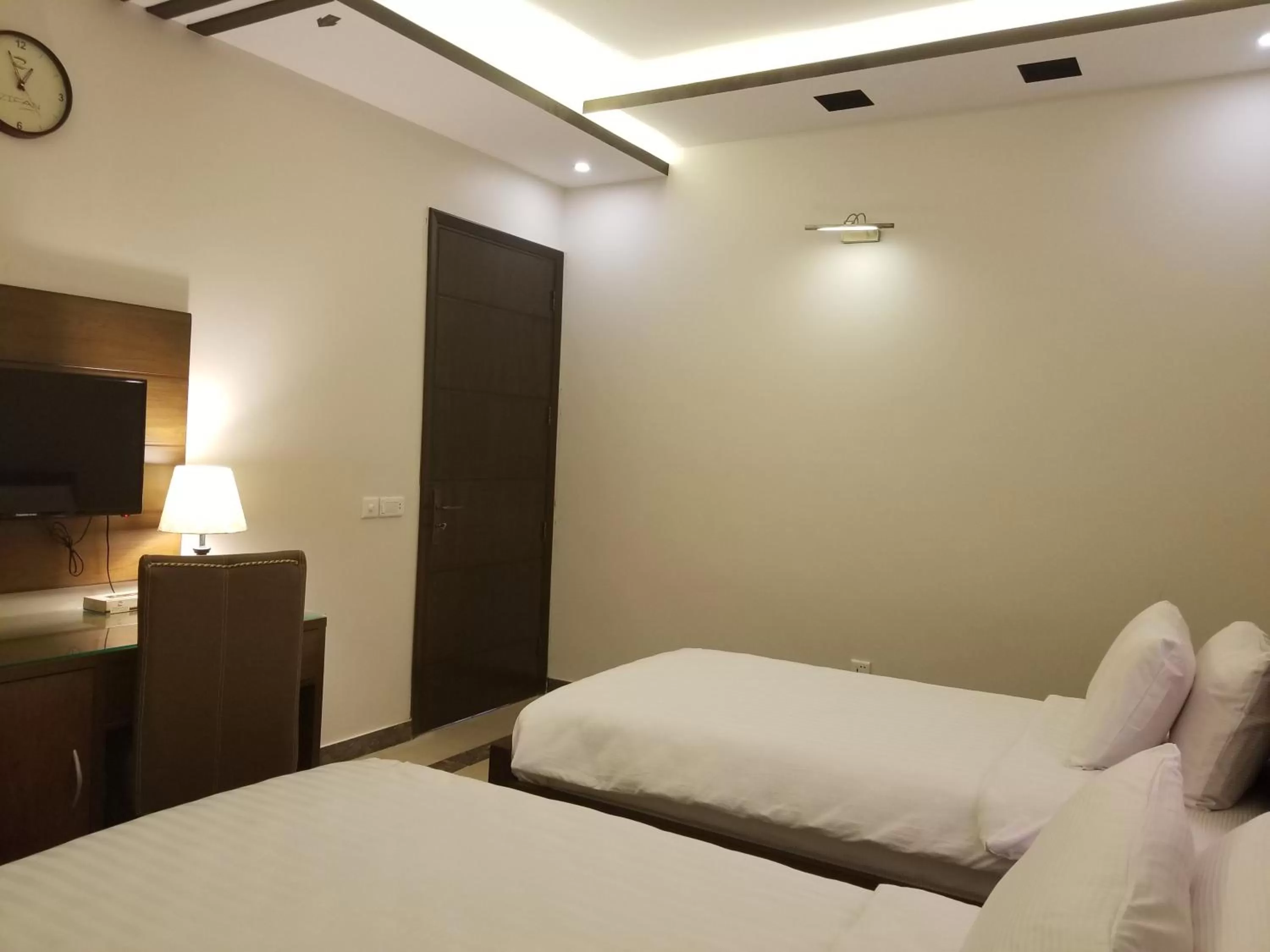 Bed in Zifan Hotel & Suites