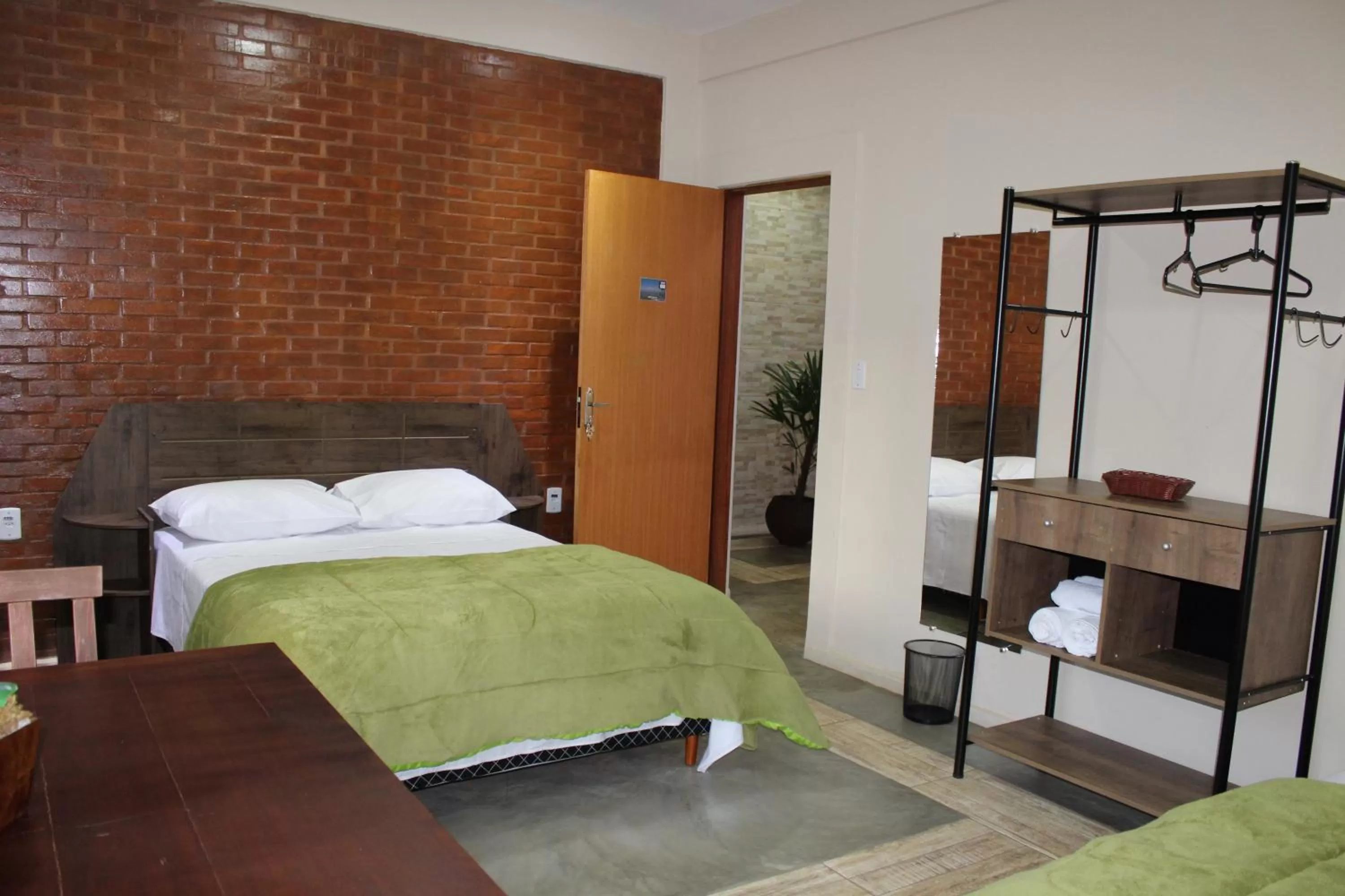 Bed in Pousada Morro dos Ventos