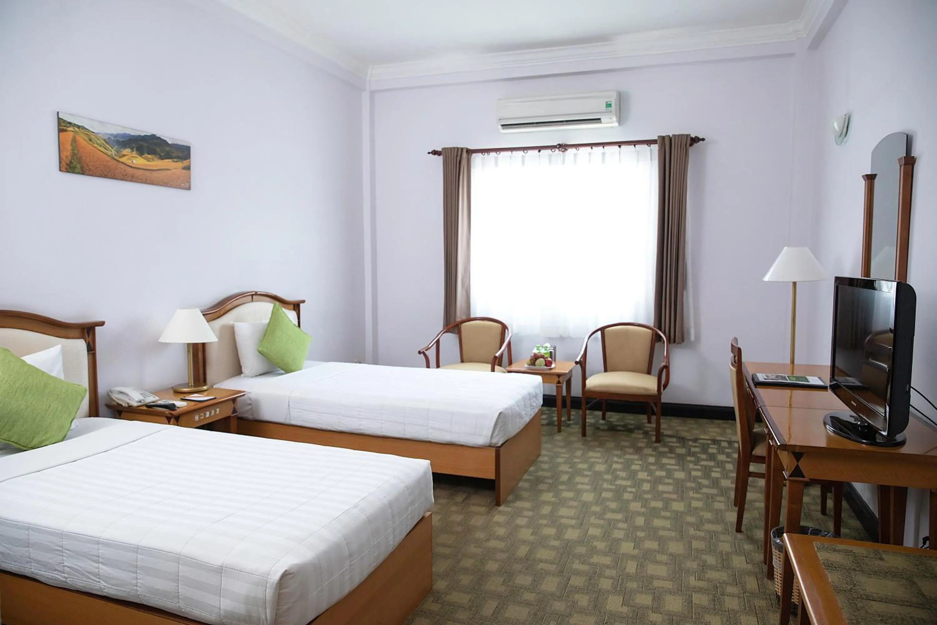 Bed in Liberty Hotel Saigon Parkview