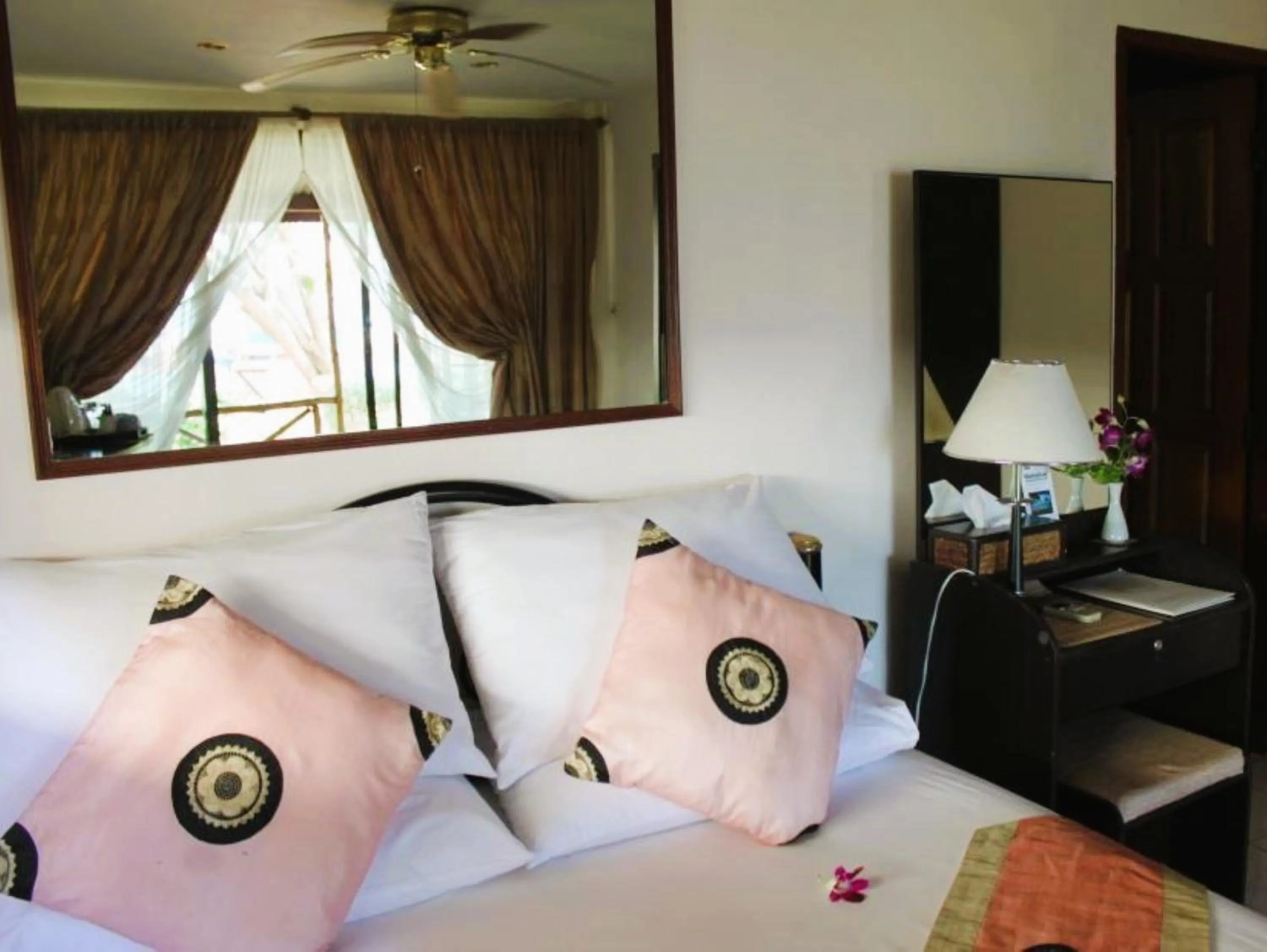 Bed in The Waterfront Hotel at Fisherman's Village