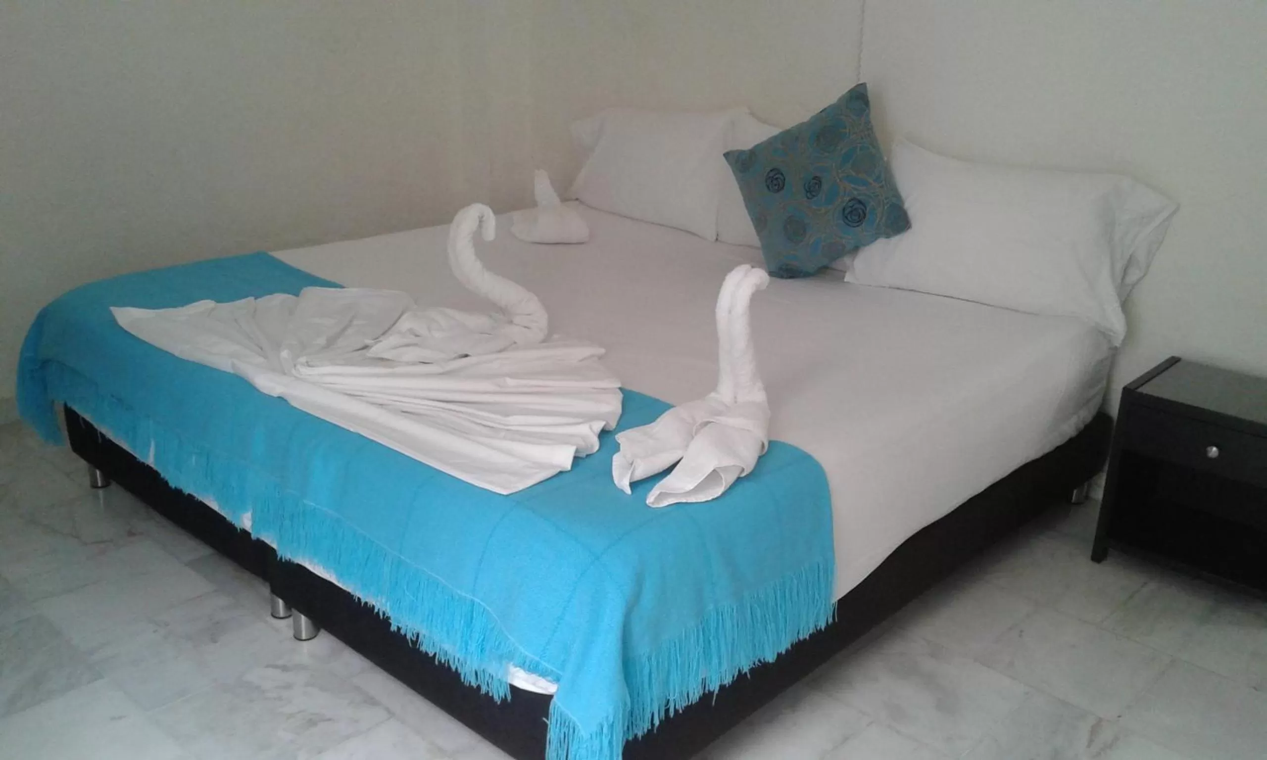 Bed in Blue Star Hotel