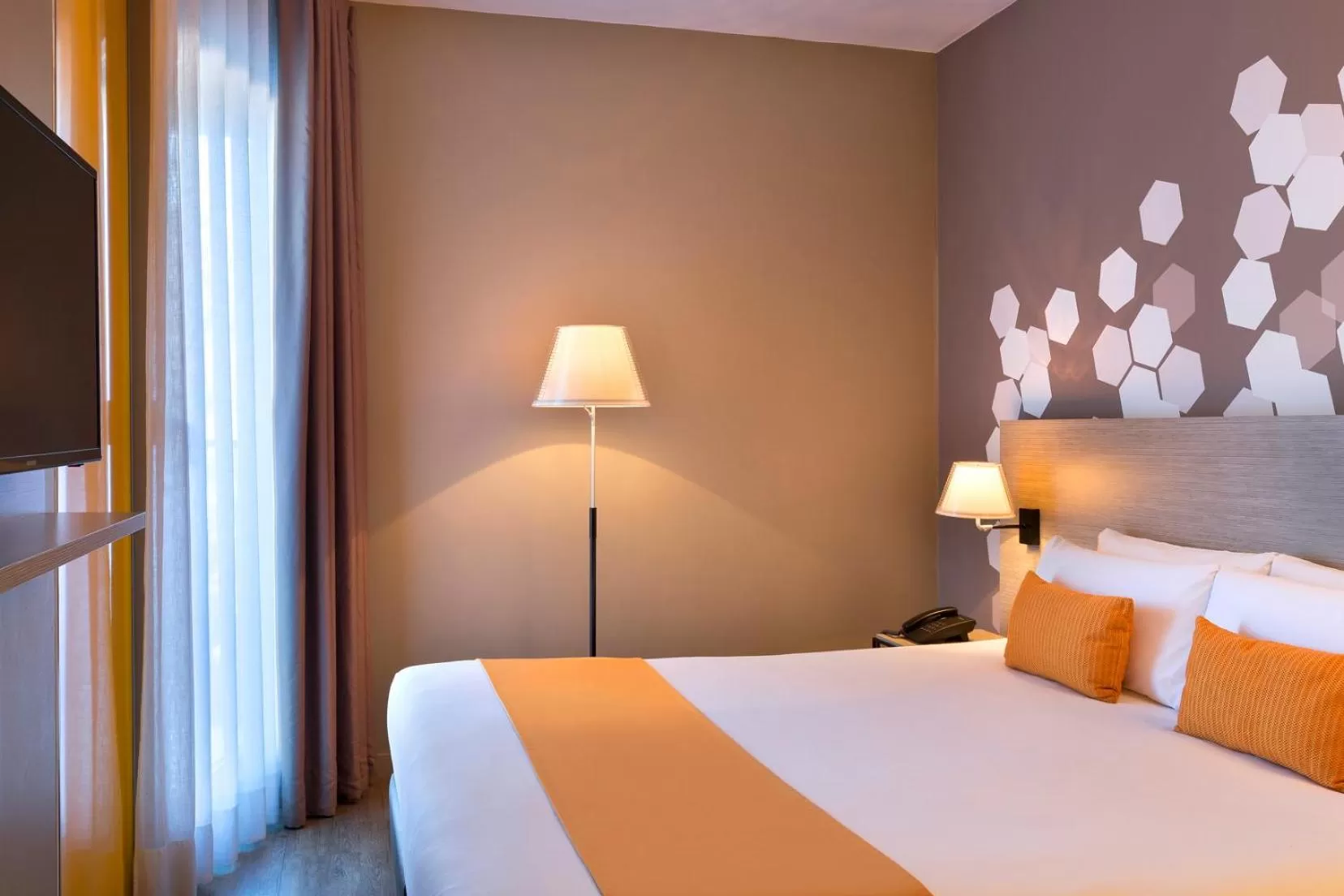 Bed in Citadines Ramblas Barcelona