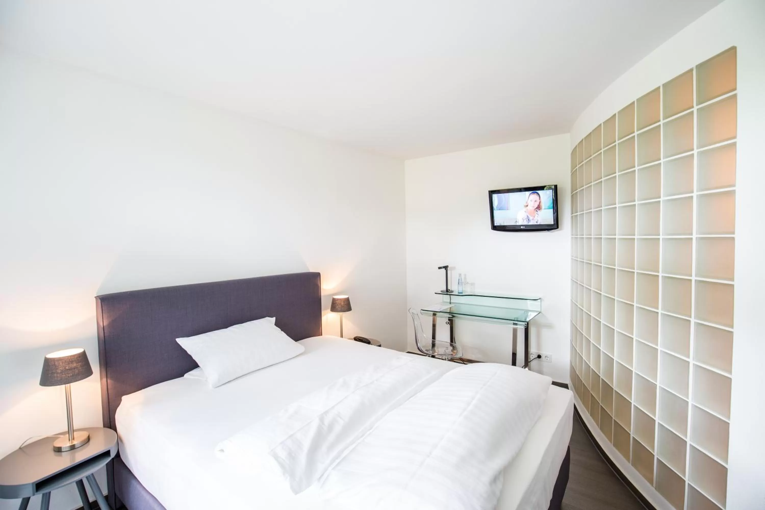 Photo of the whole room, Bed in Wald & Golfhotel Lottental