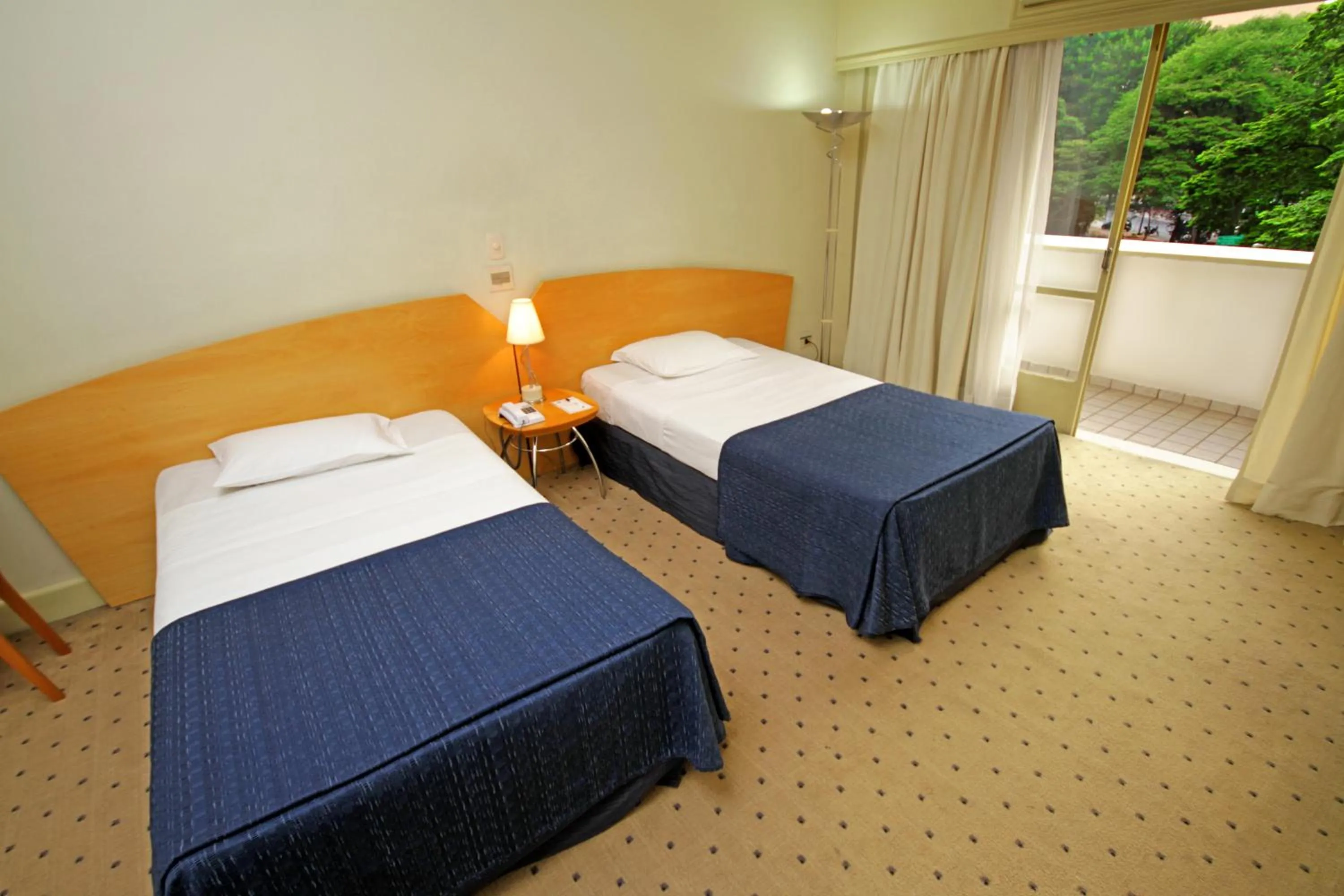 Bed in San Raphael Hotel