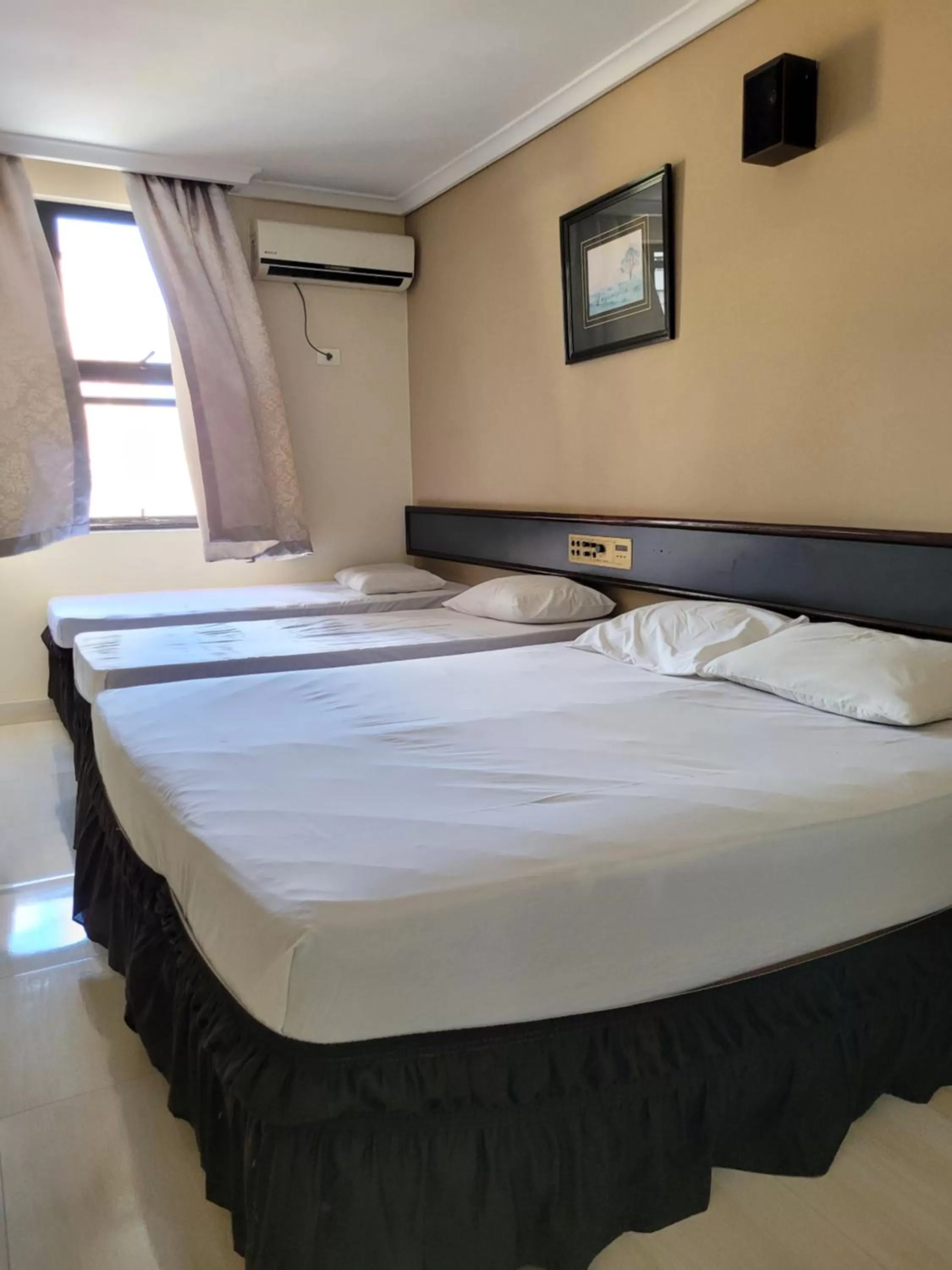 Bed in Hotel Estação Express