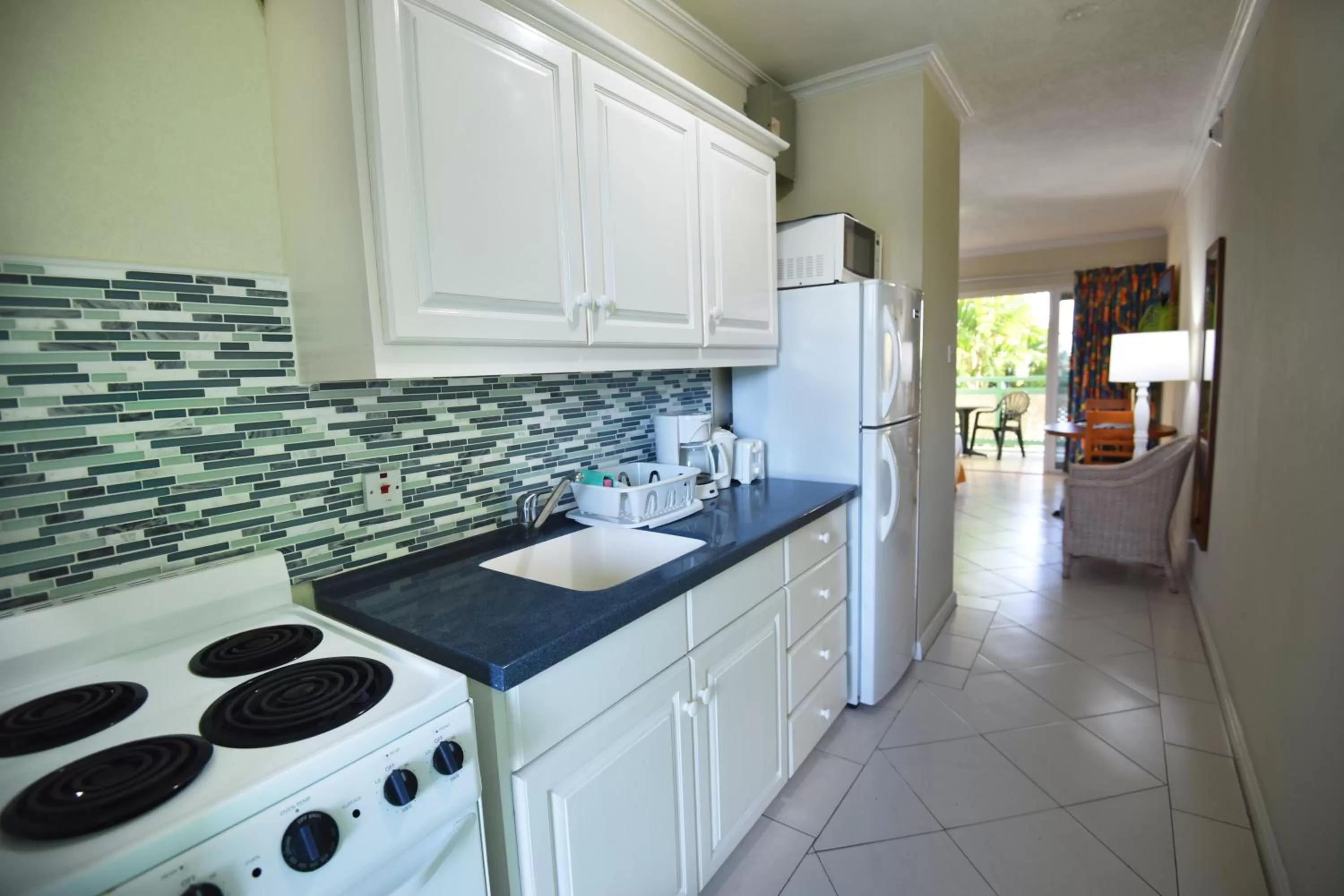 Kitchen or kitchenette in Coral Mist Beach Hotel