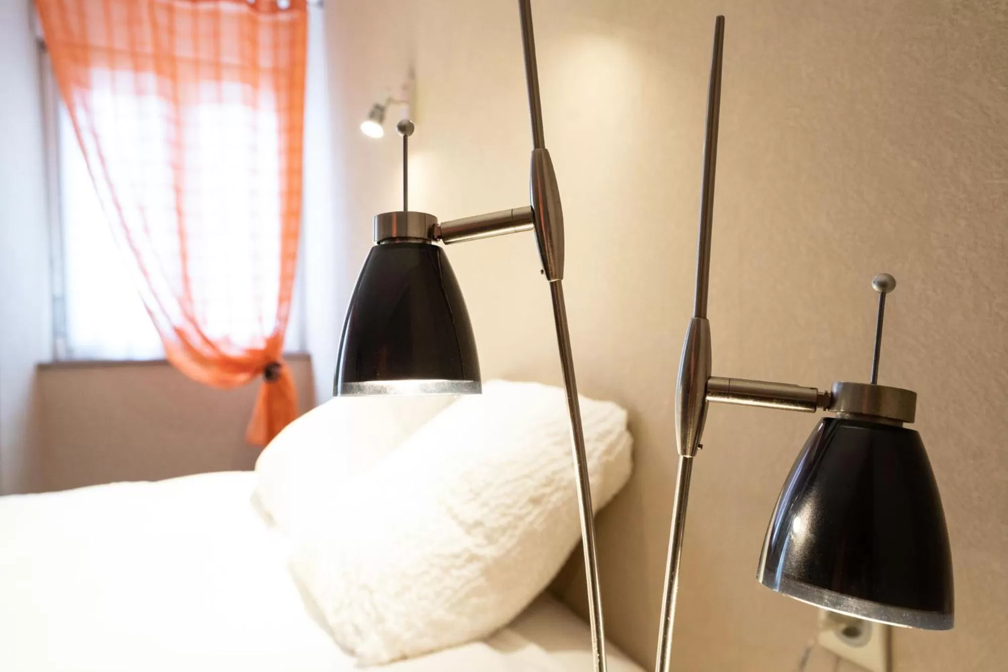 Bed in Logis Central Hôtel - Restaurant & Spa