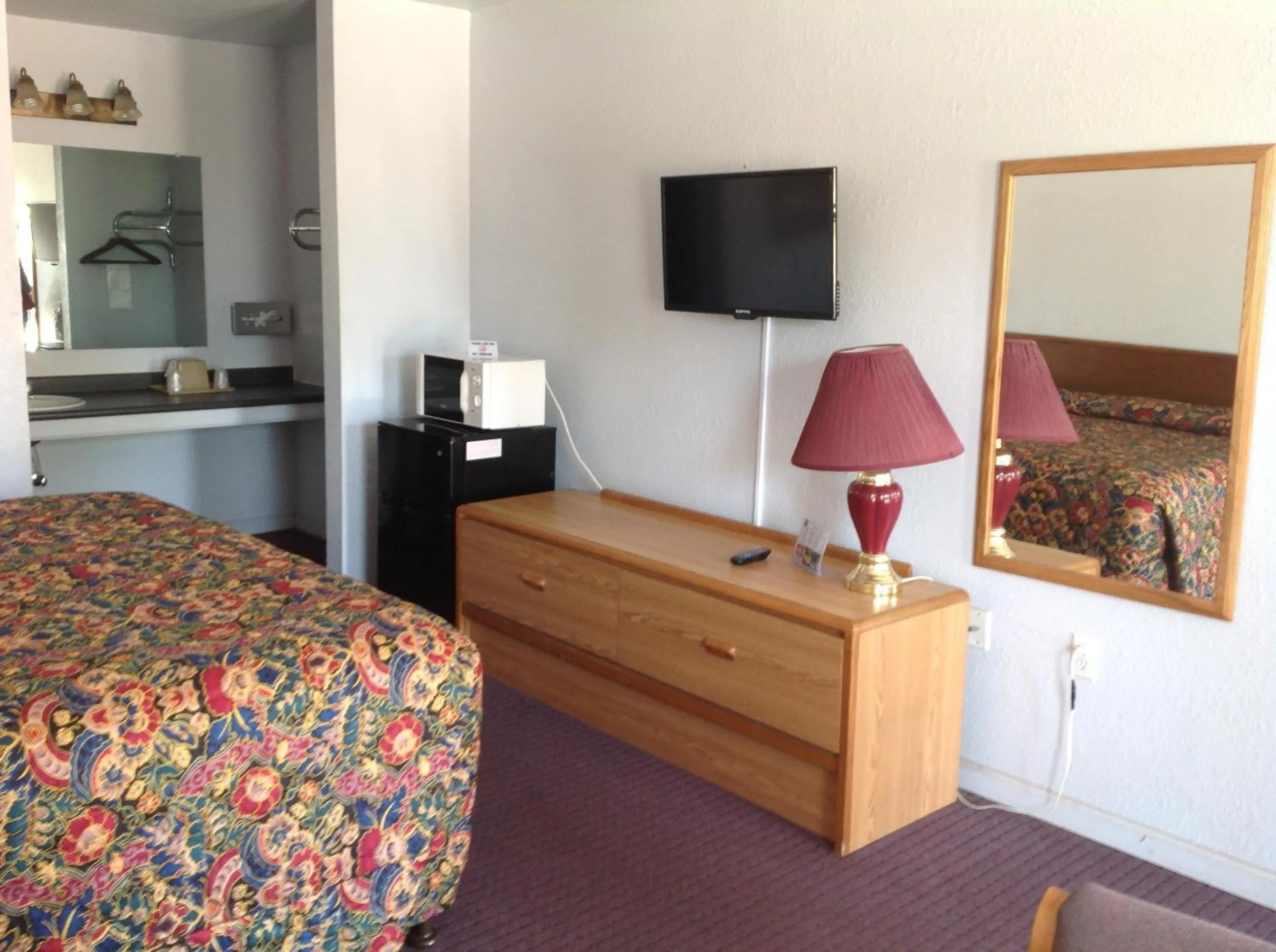 Bed in Knights Inn Muskogee