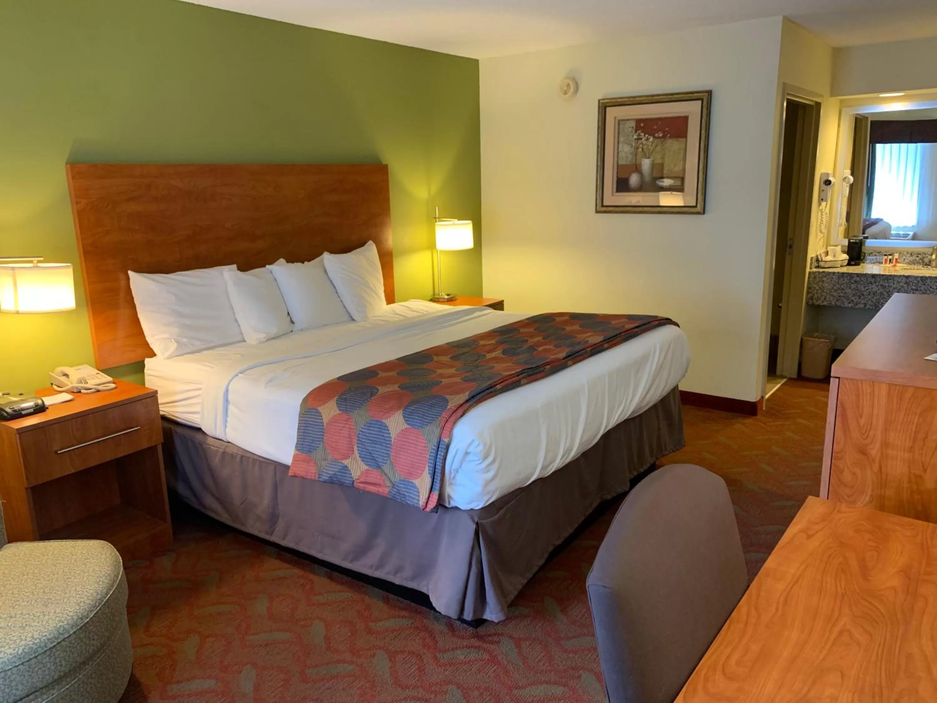 Bed in Baymont by Wyndham Cave City