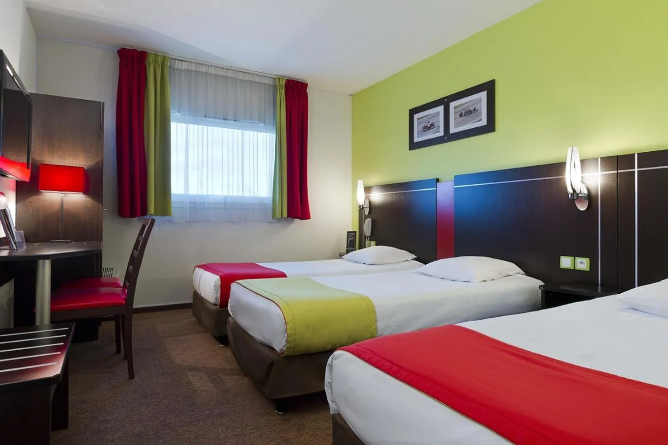 Photo of the whole room, Bed in Enzo Hotels Thionville by Kyriad Direct