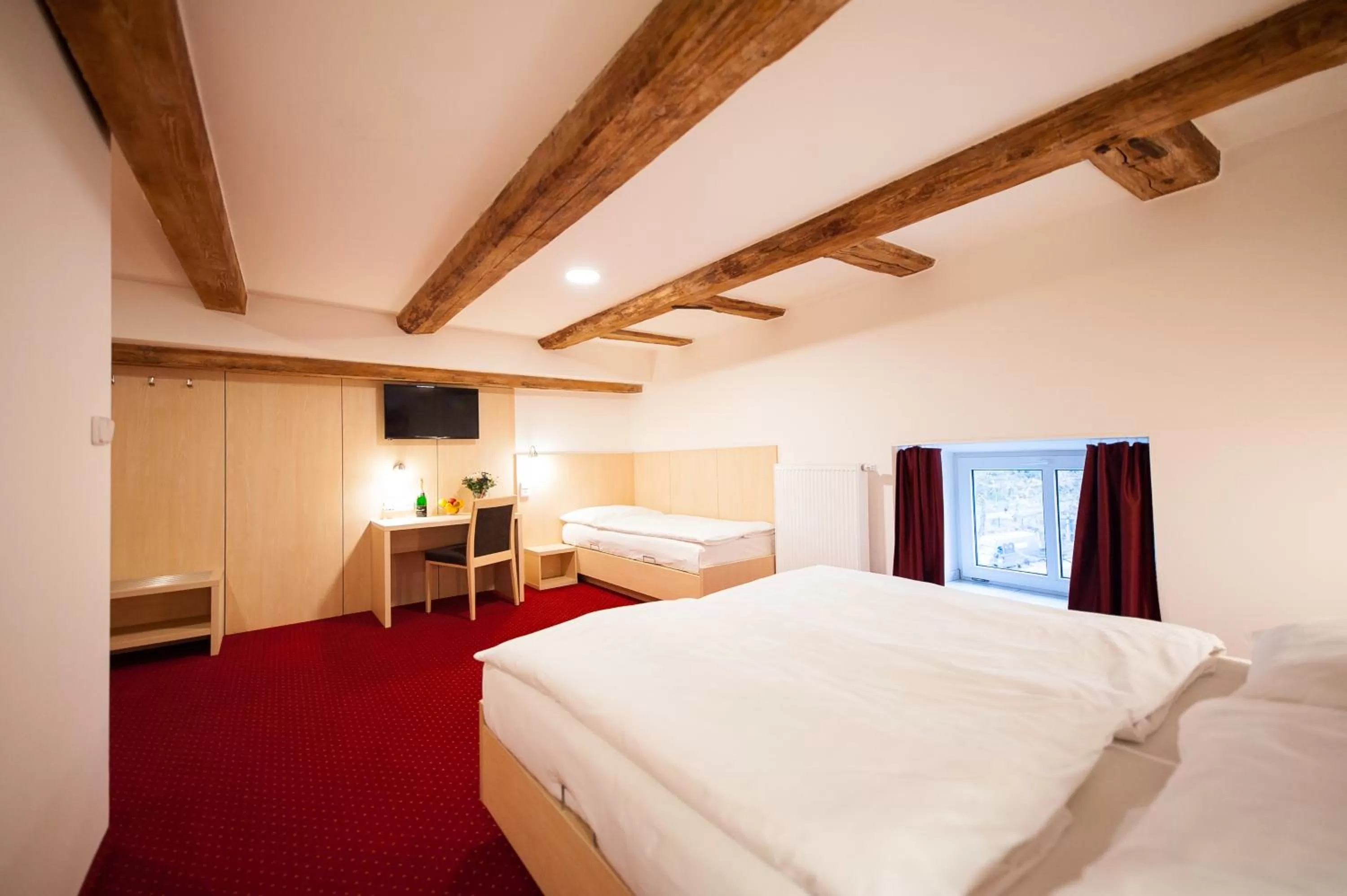 Bed in Hotel Pivovar