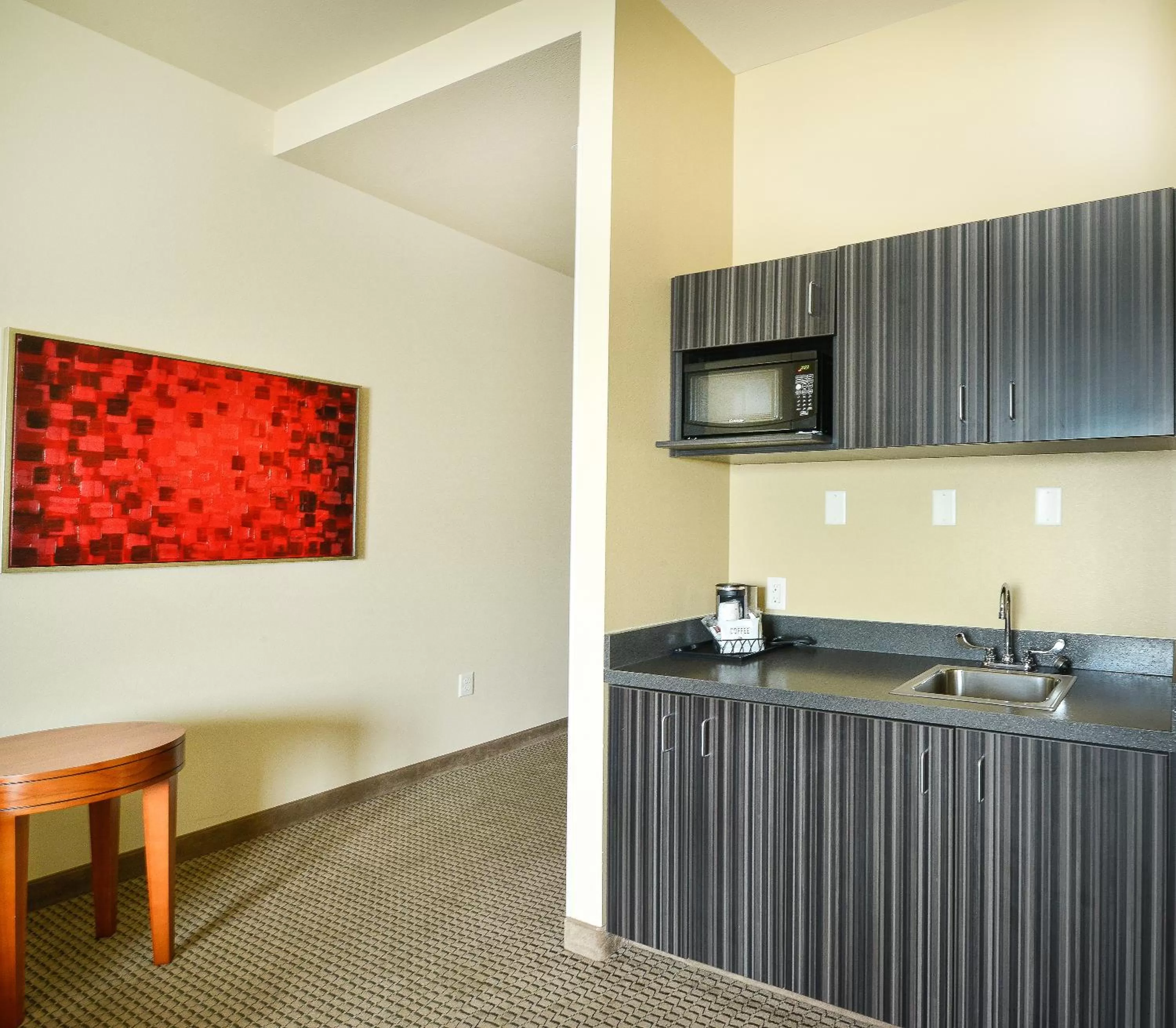 Kitchen or kitchenette in Baymont by Wyndham Grand Forks