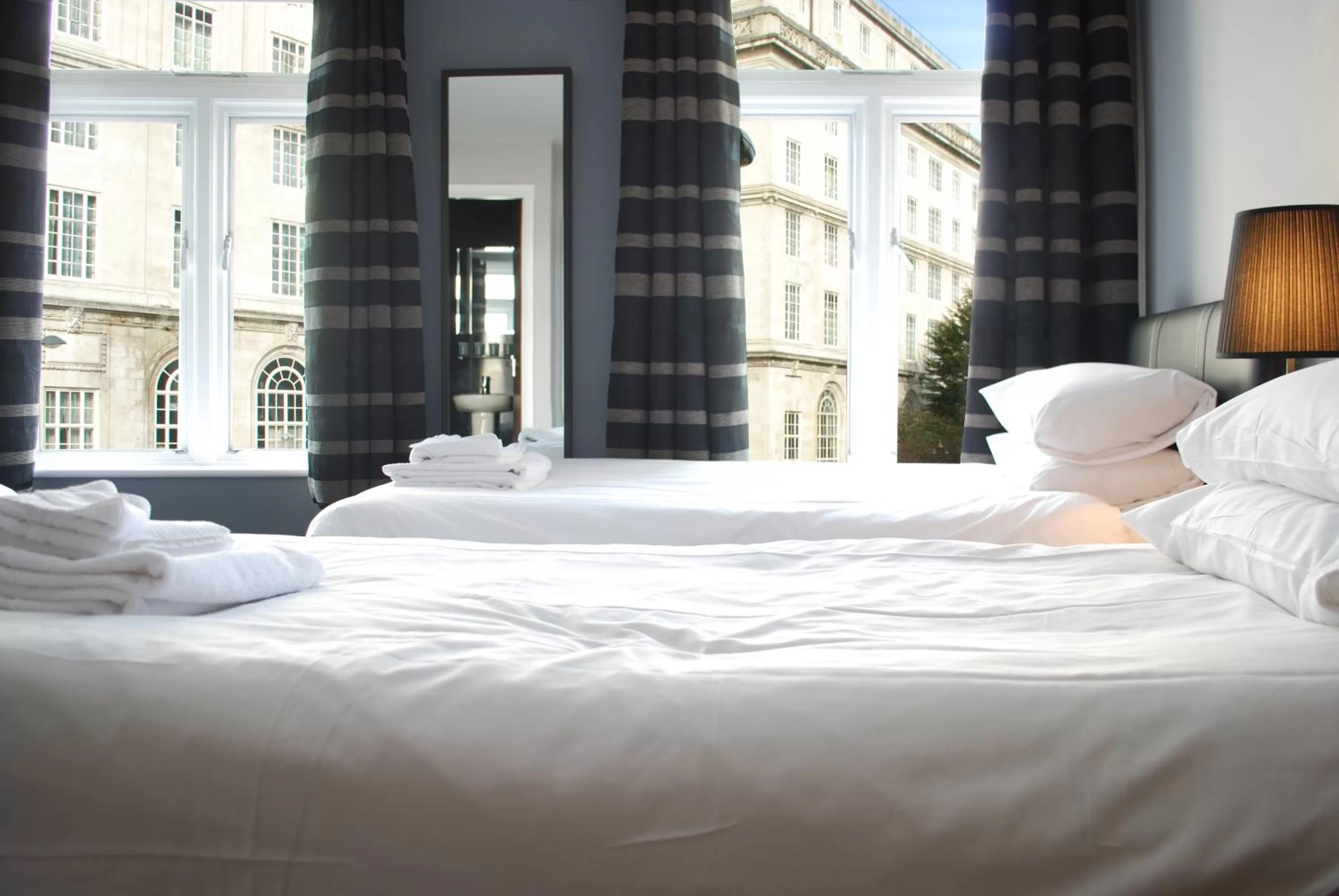 Bed in The Liverpool Inn Hotel