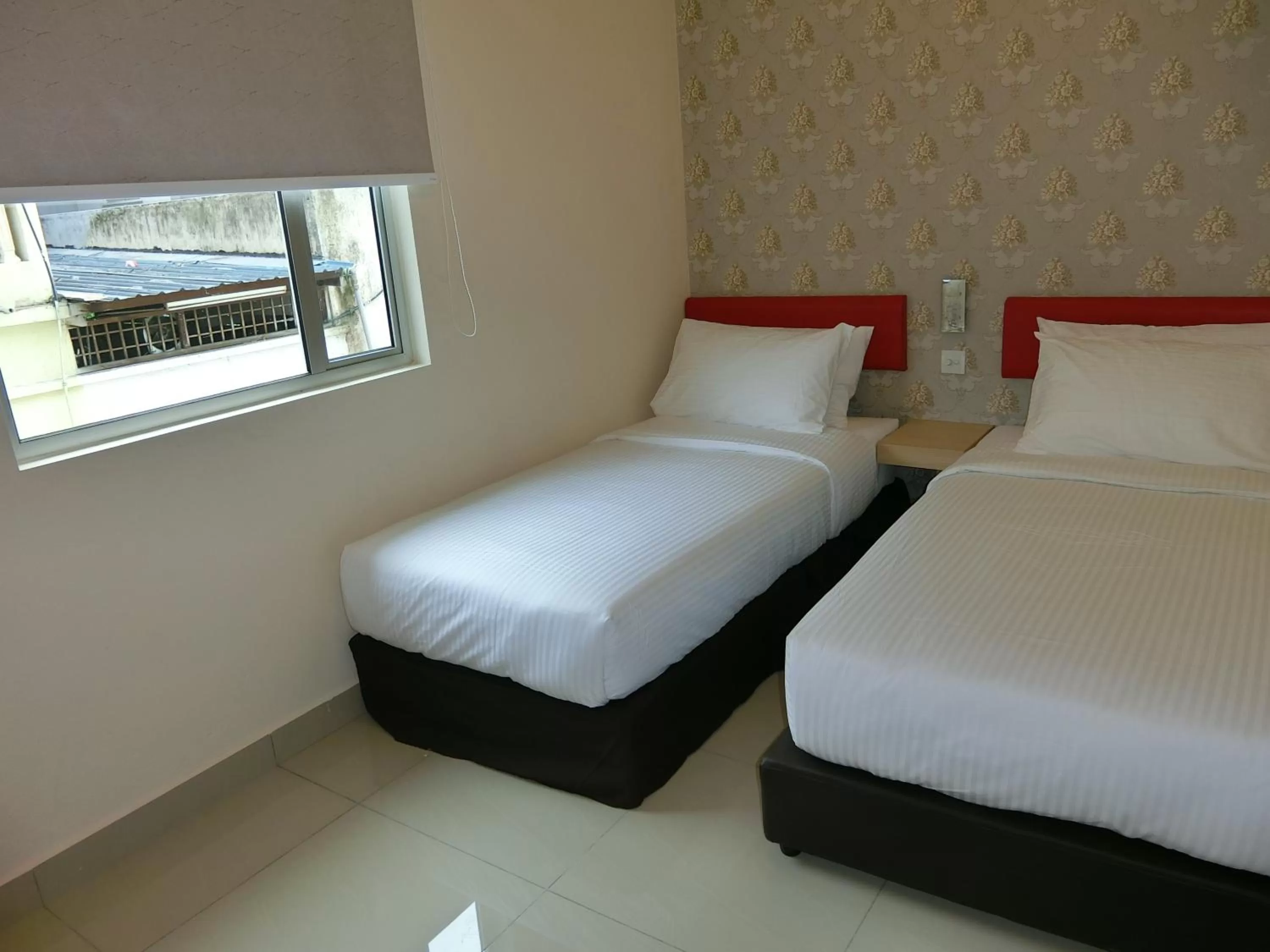 Bed in Carlsun Hotel