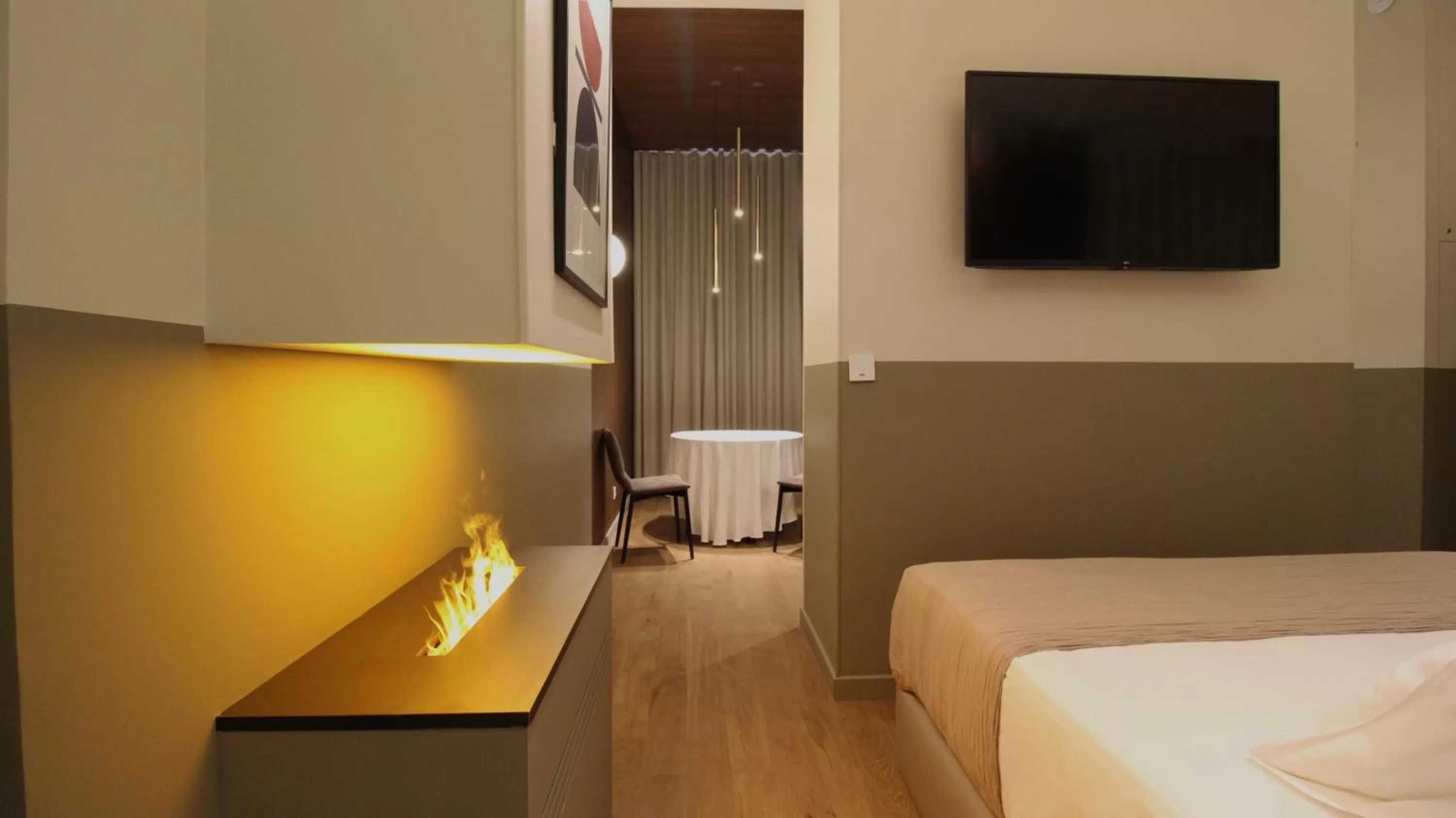 Photo of the whole room, TV/Entertainment Center in MiHotel Sala