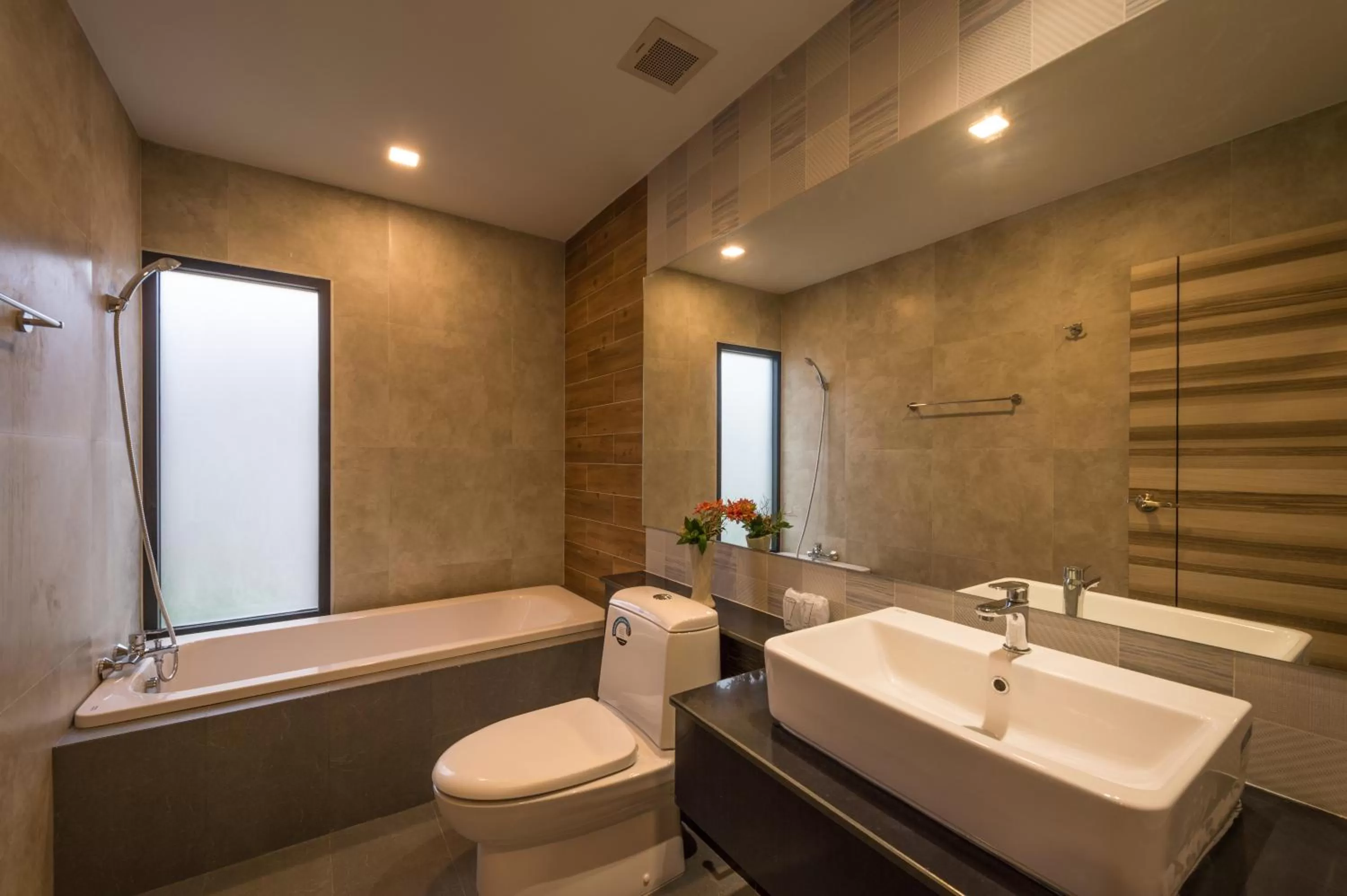 Shower in Cher​mantra​ Aonang​ Resort & Pool​ Suite