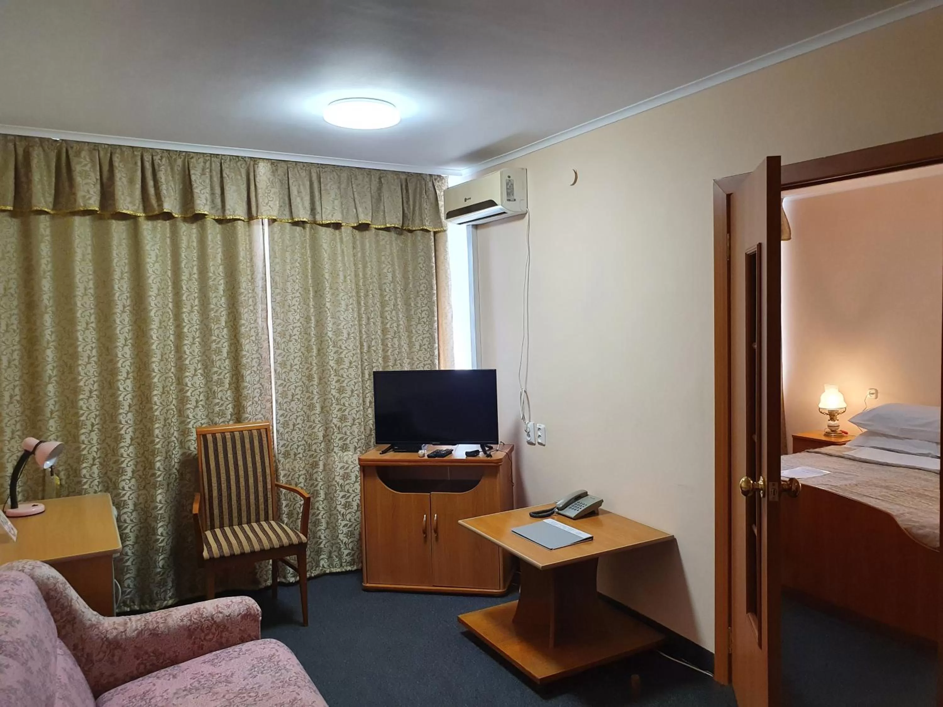 Photo of the whole room, TV/Entertainment Center in Aktobe Hotel