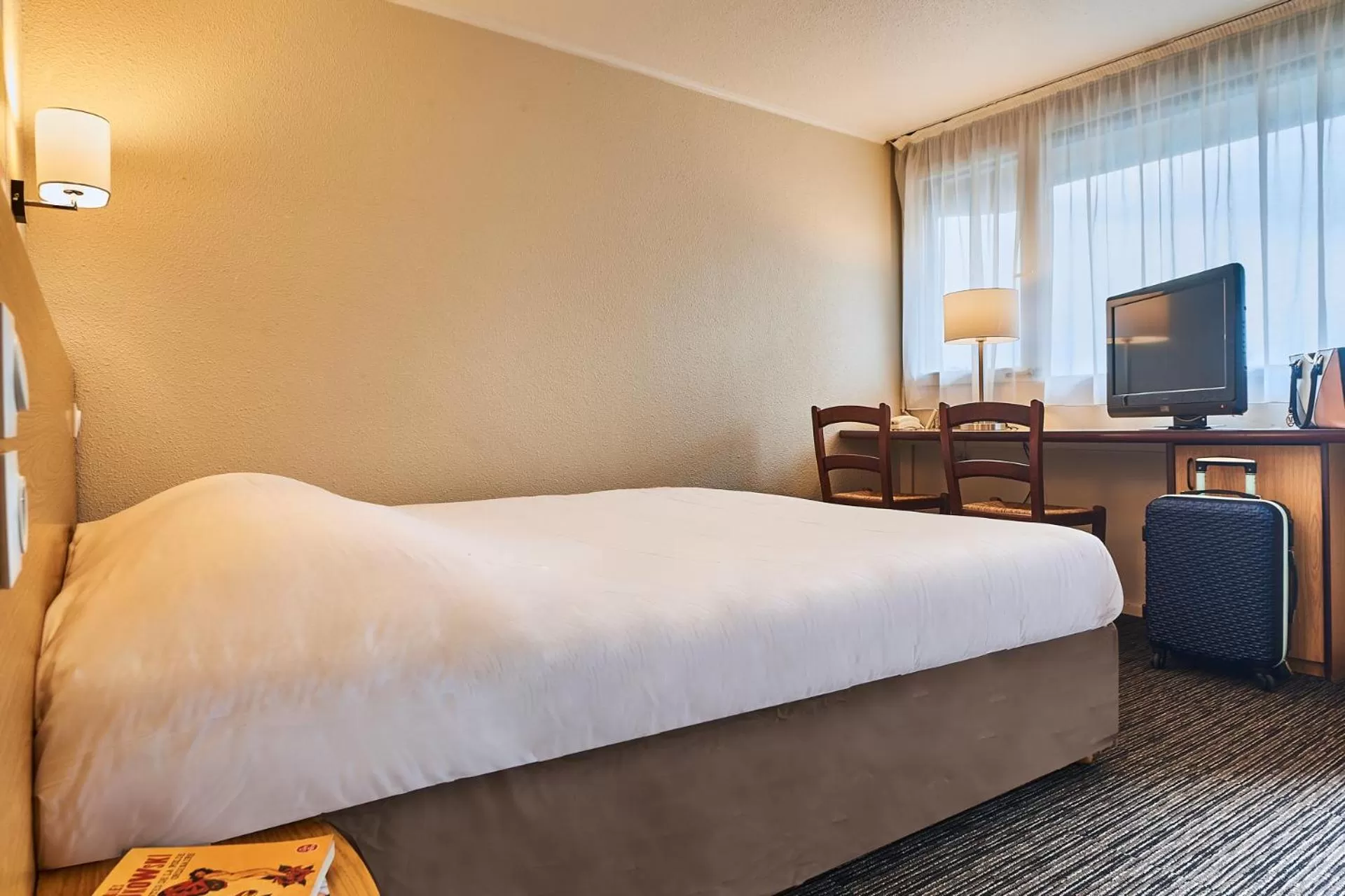 Bedroom, Bed in Kyriad Direct Saint-Dizier