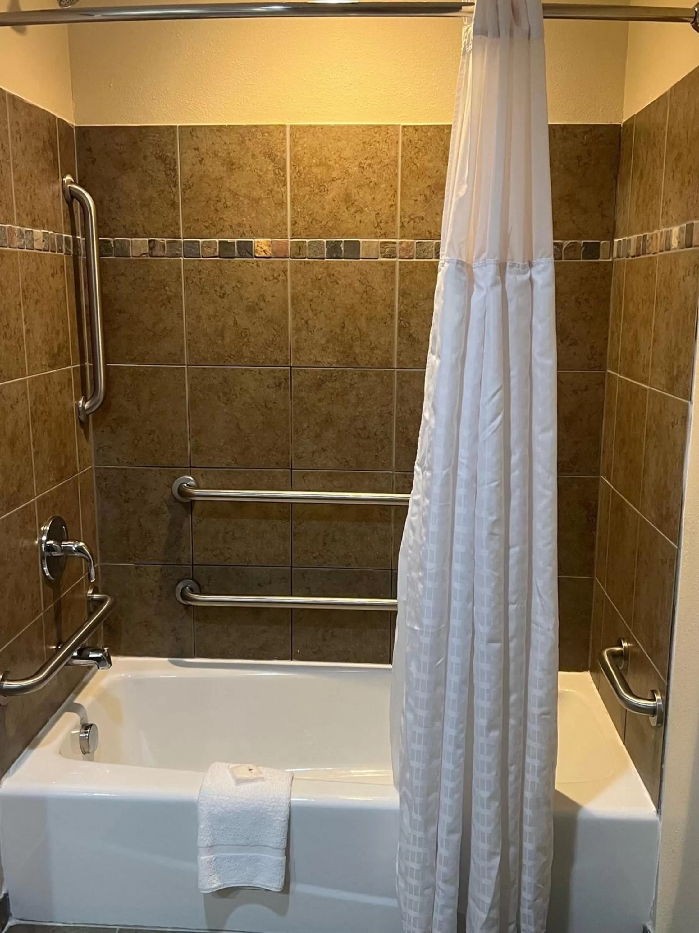 Bathroom in HomeTowne Studios & Suites by Red Roof Washington
