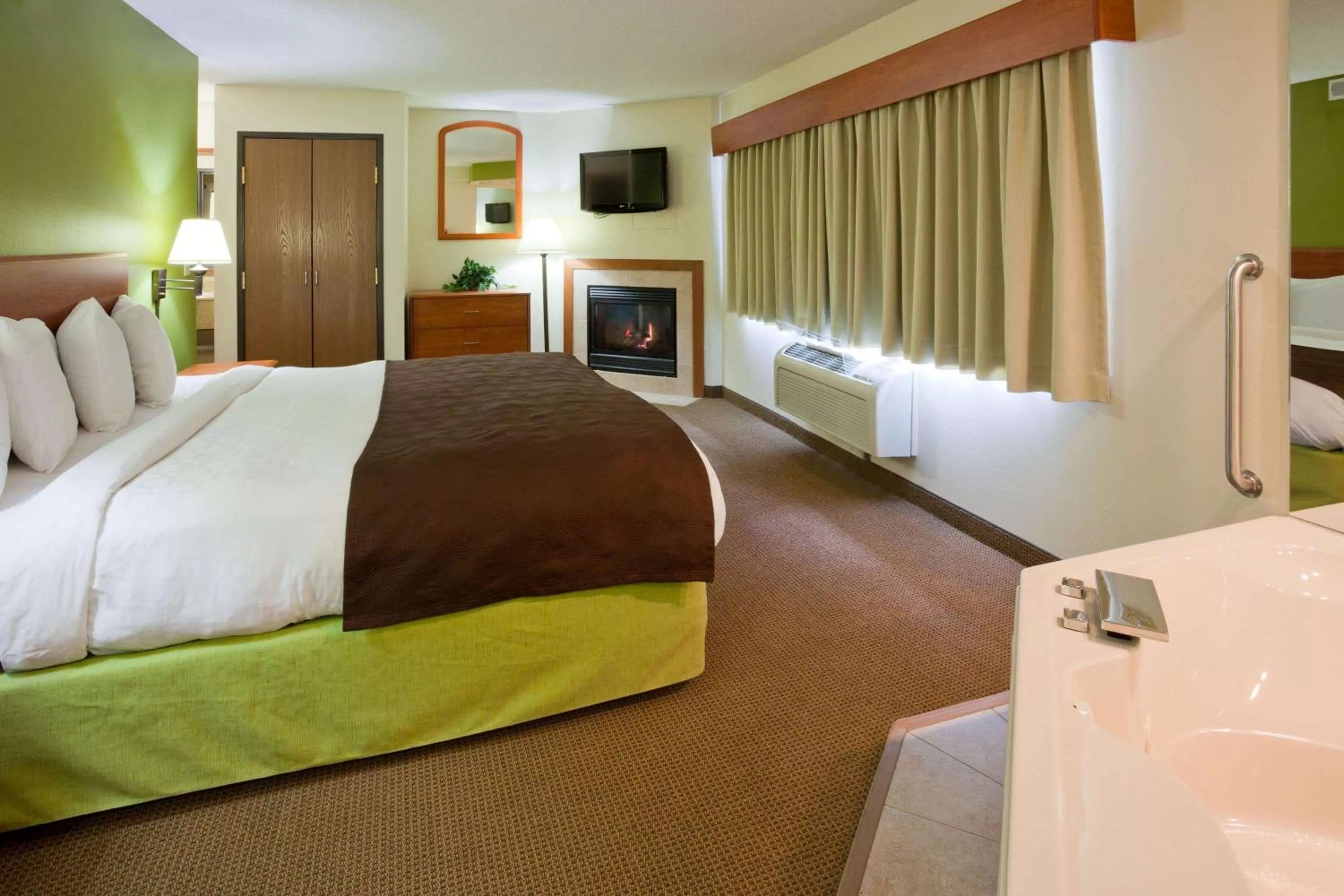 Photo of the whole room, Bed in AmericInn by Wyndham Thief River Falls