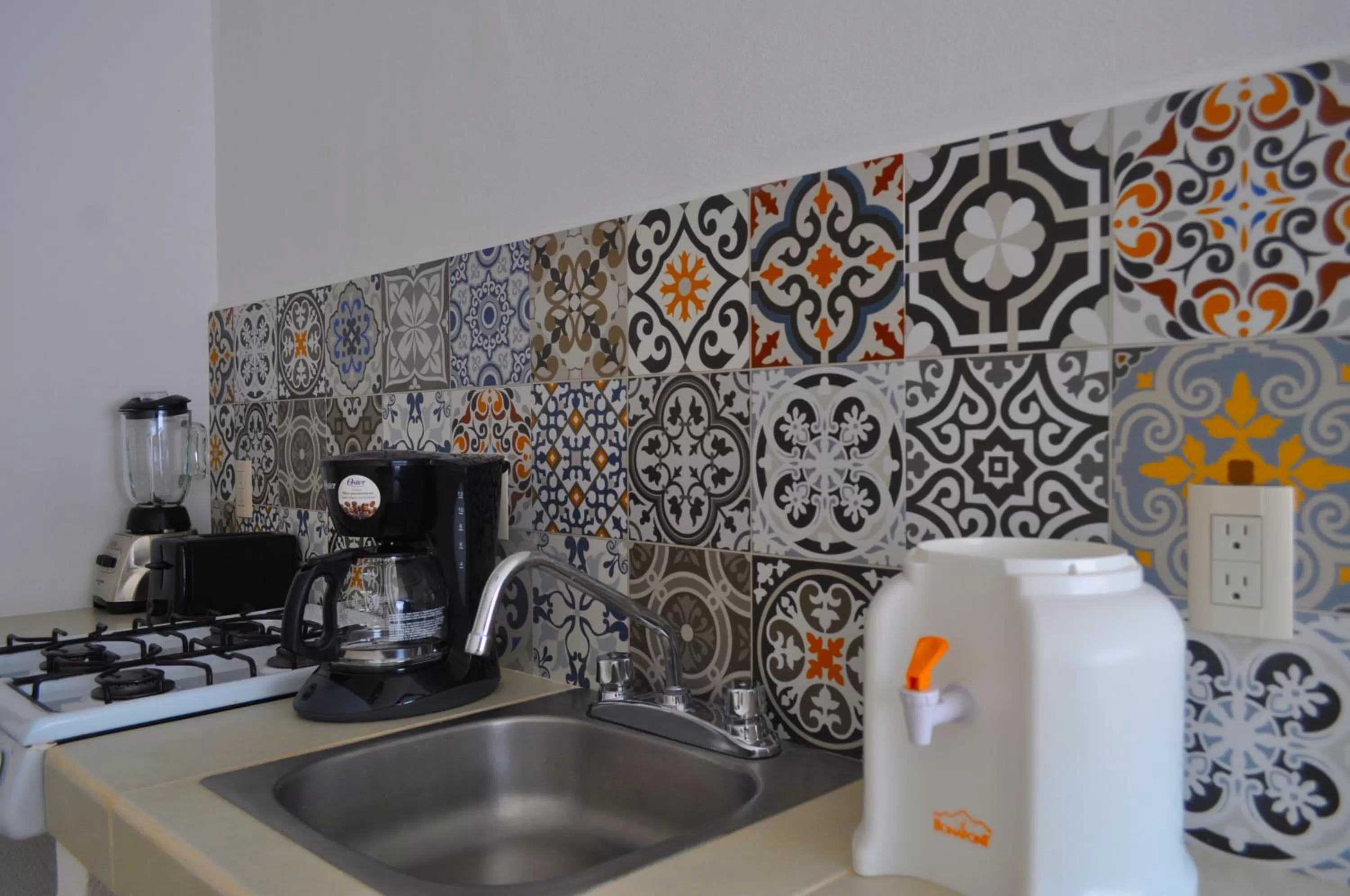 Kitchen or kitchenette in Petit Hotel Pilitas