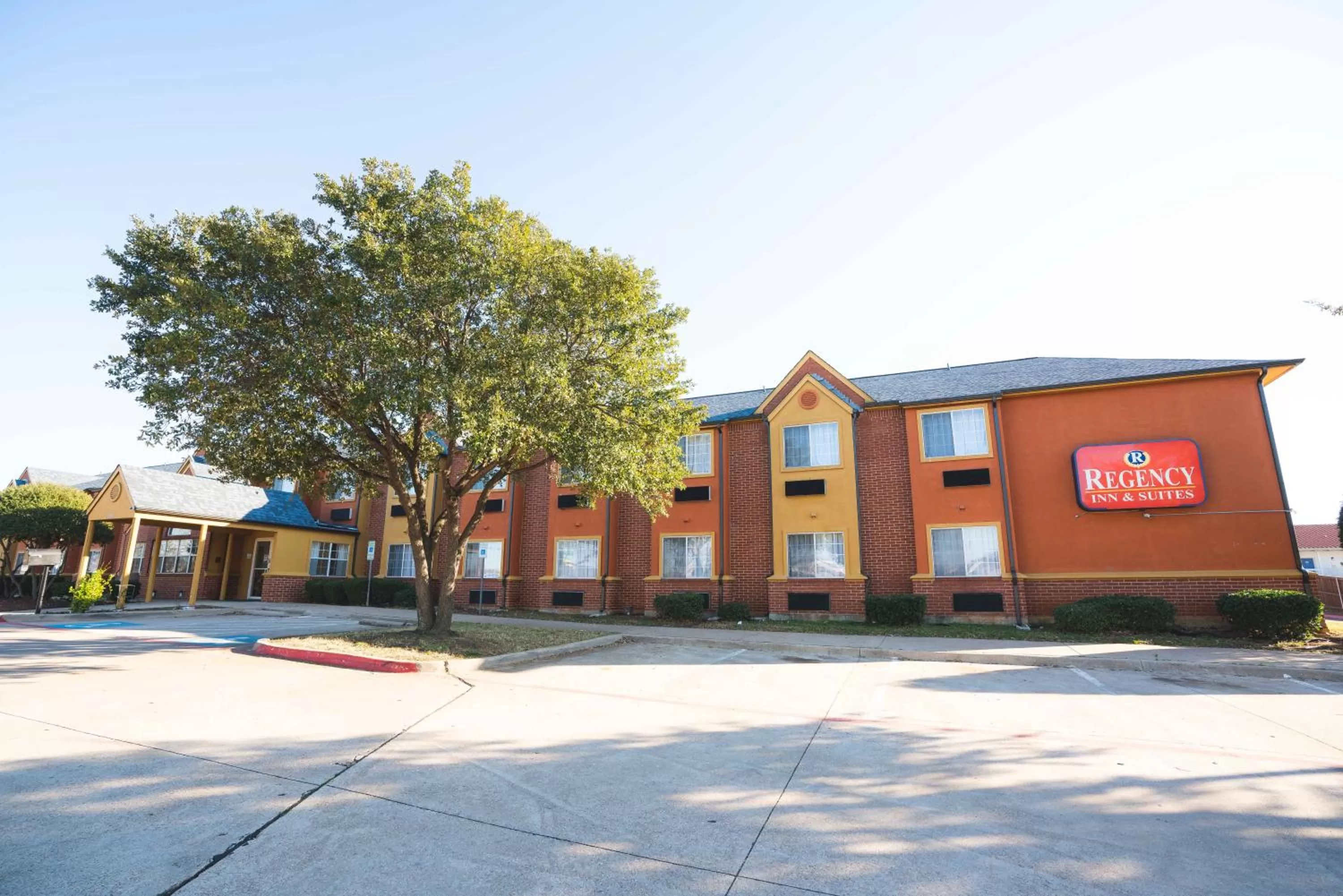 Property building in Regency Inn & Suites DFW