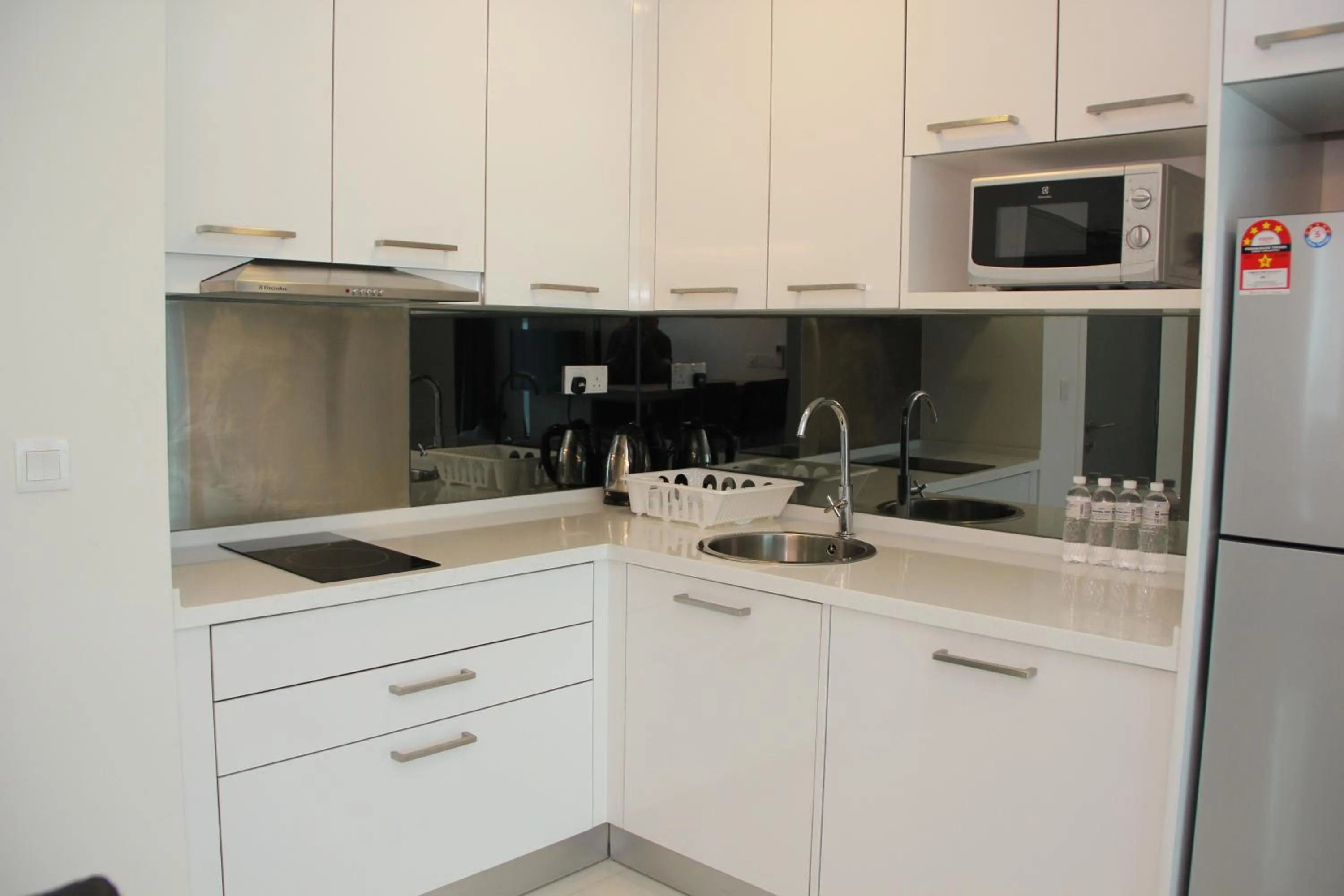 Kitchen or kitchenette in Summer Suites Residences by Subhome