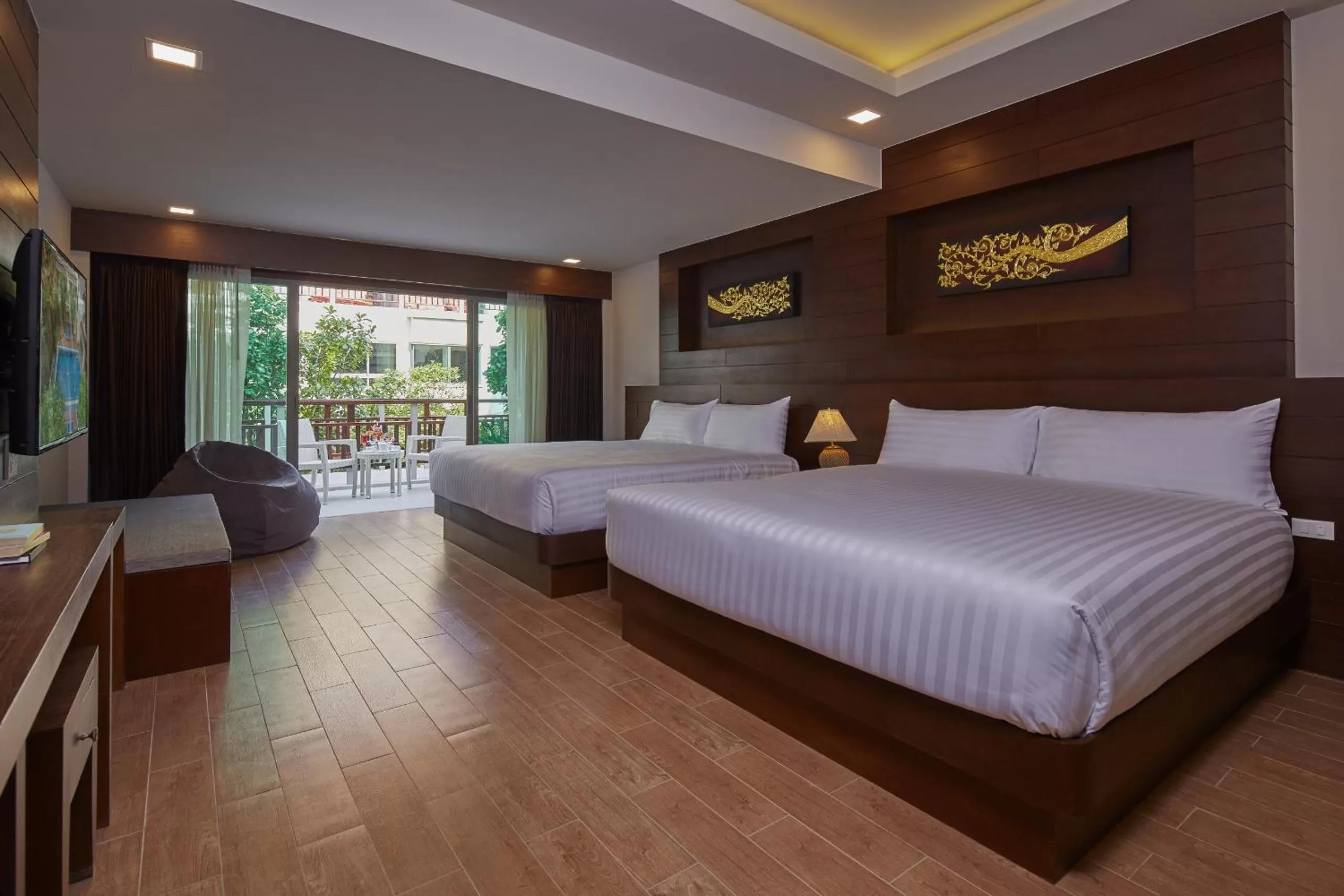 Bed in The Agate Pattaya Boutique Resort
