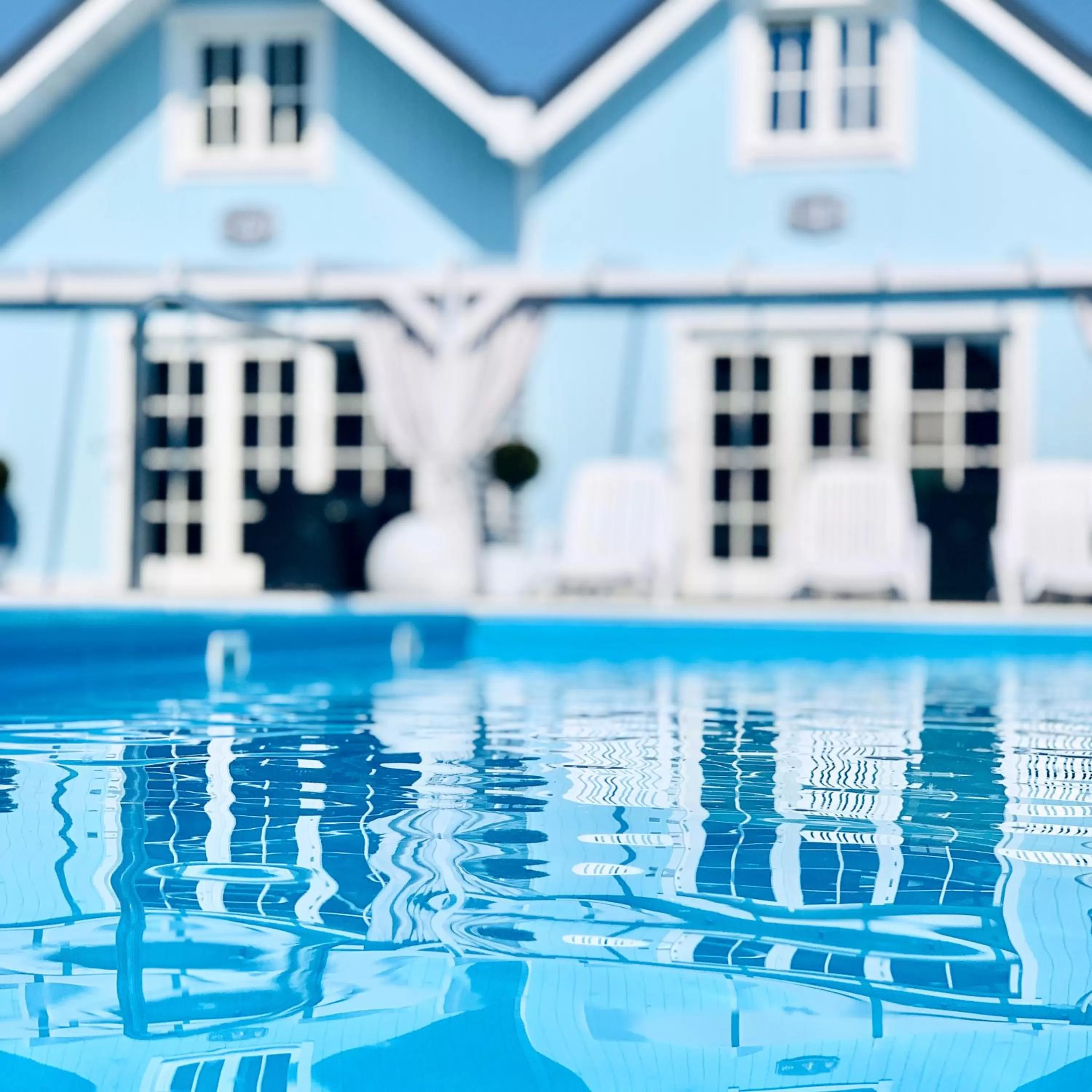 Property building, Swimming Pool in Baltic Family - domki całoroczne nad morzem basen kidsclub rowery