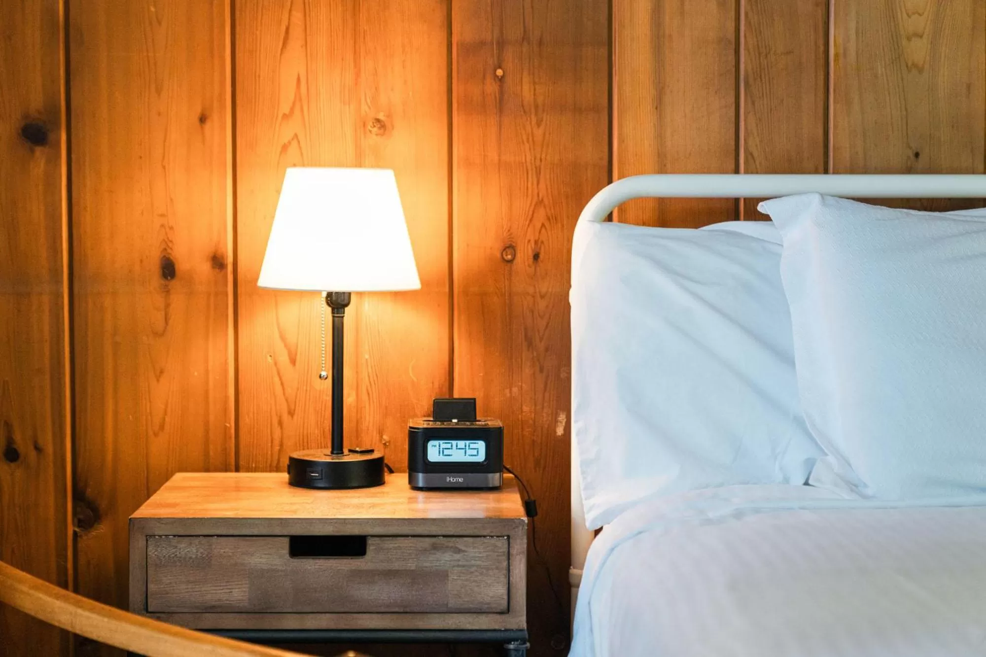 Bed in Whispering Winds Motel