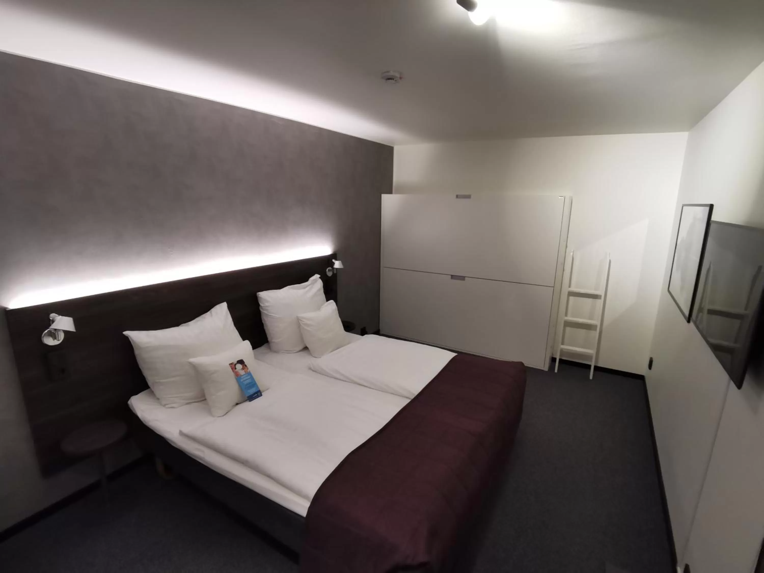 Photo of the whole room, Bed in Clarion Hotel Sense