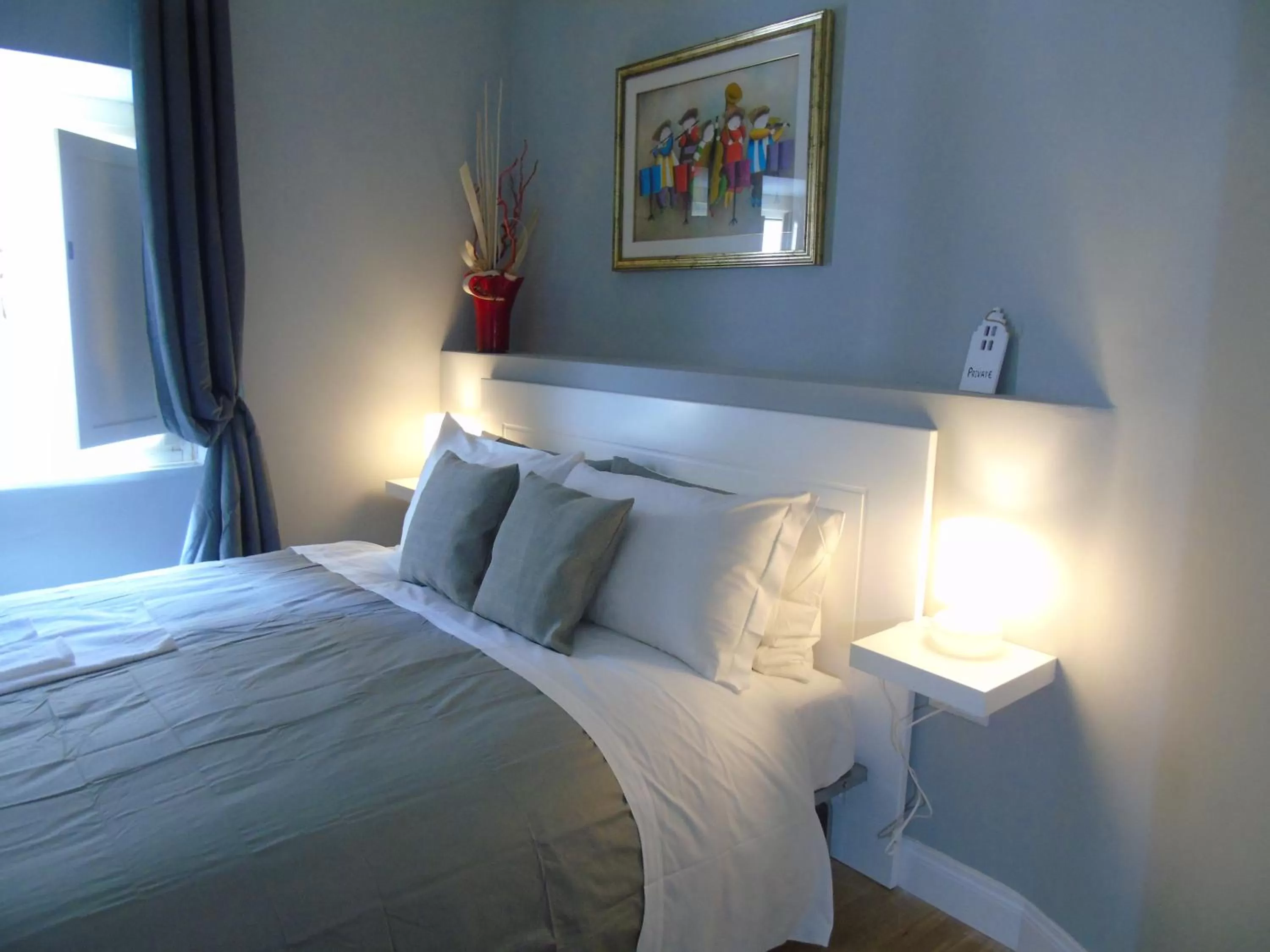 Bed in Room Inn Vatican