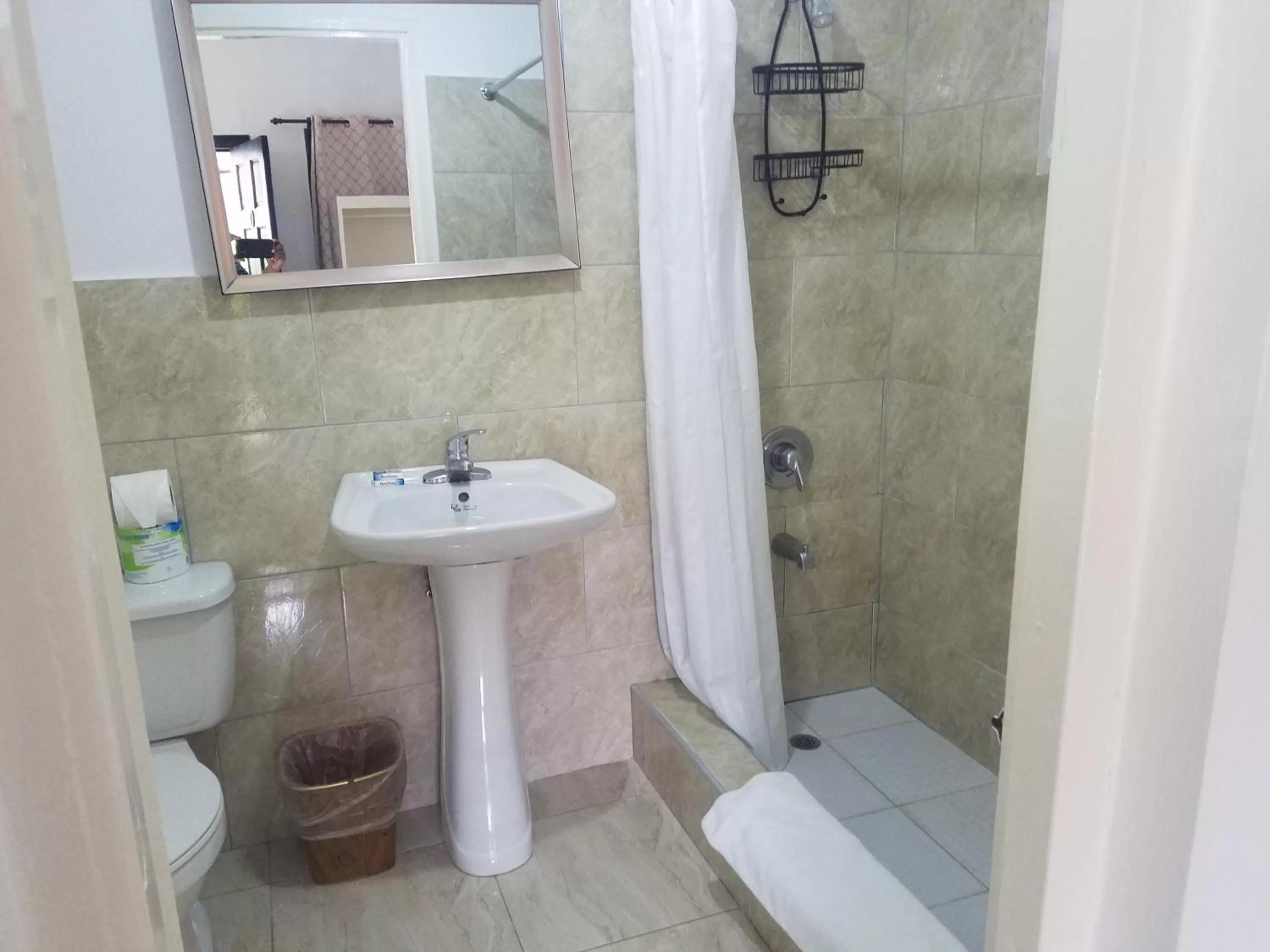 Bathroom in Roots Cafe Rooms