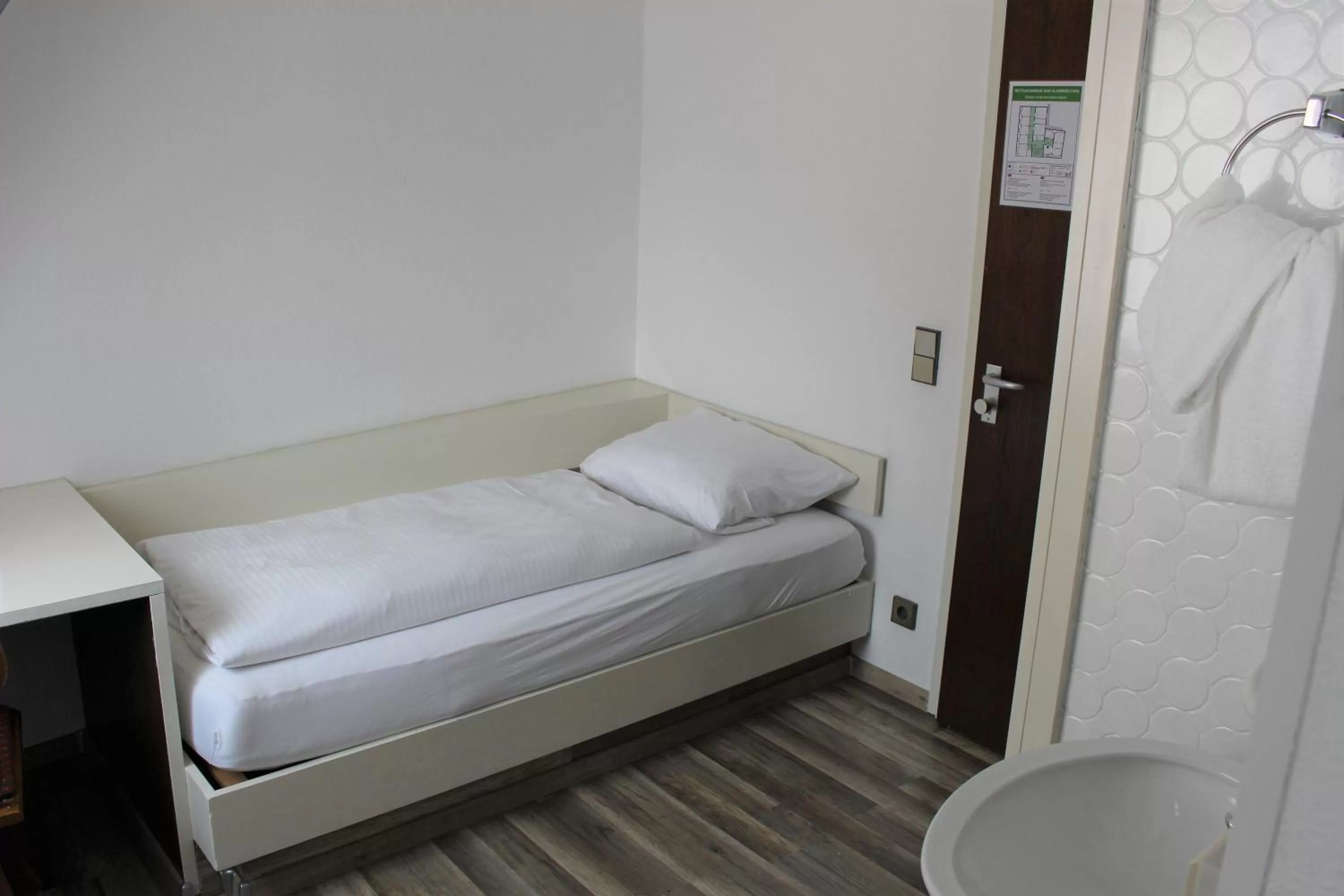 Bed in Hotel Ulmer Spatz