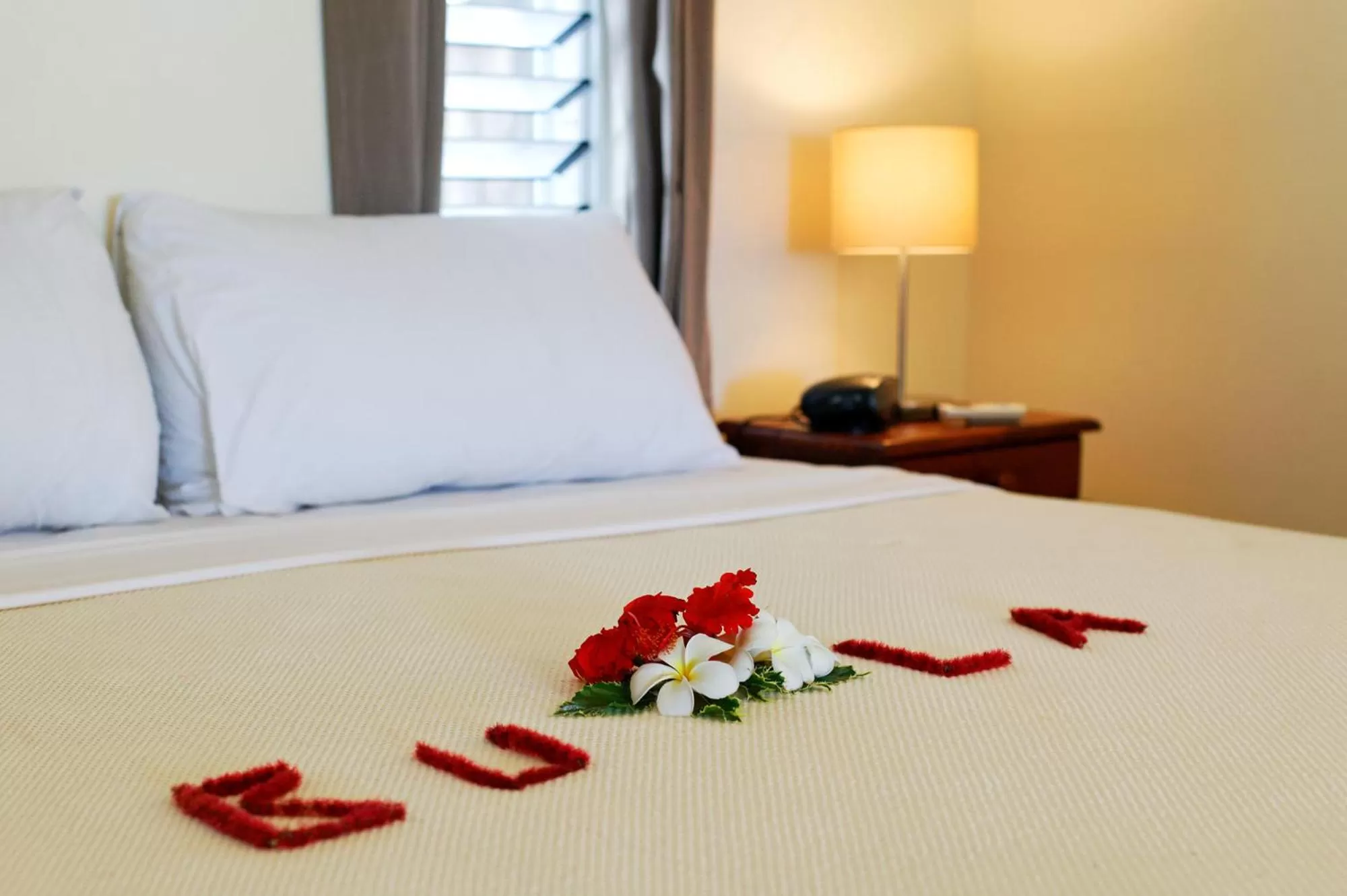 Bedroom, Bed in First Landing Beach Resort & Villas