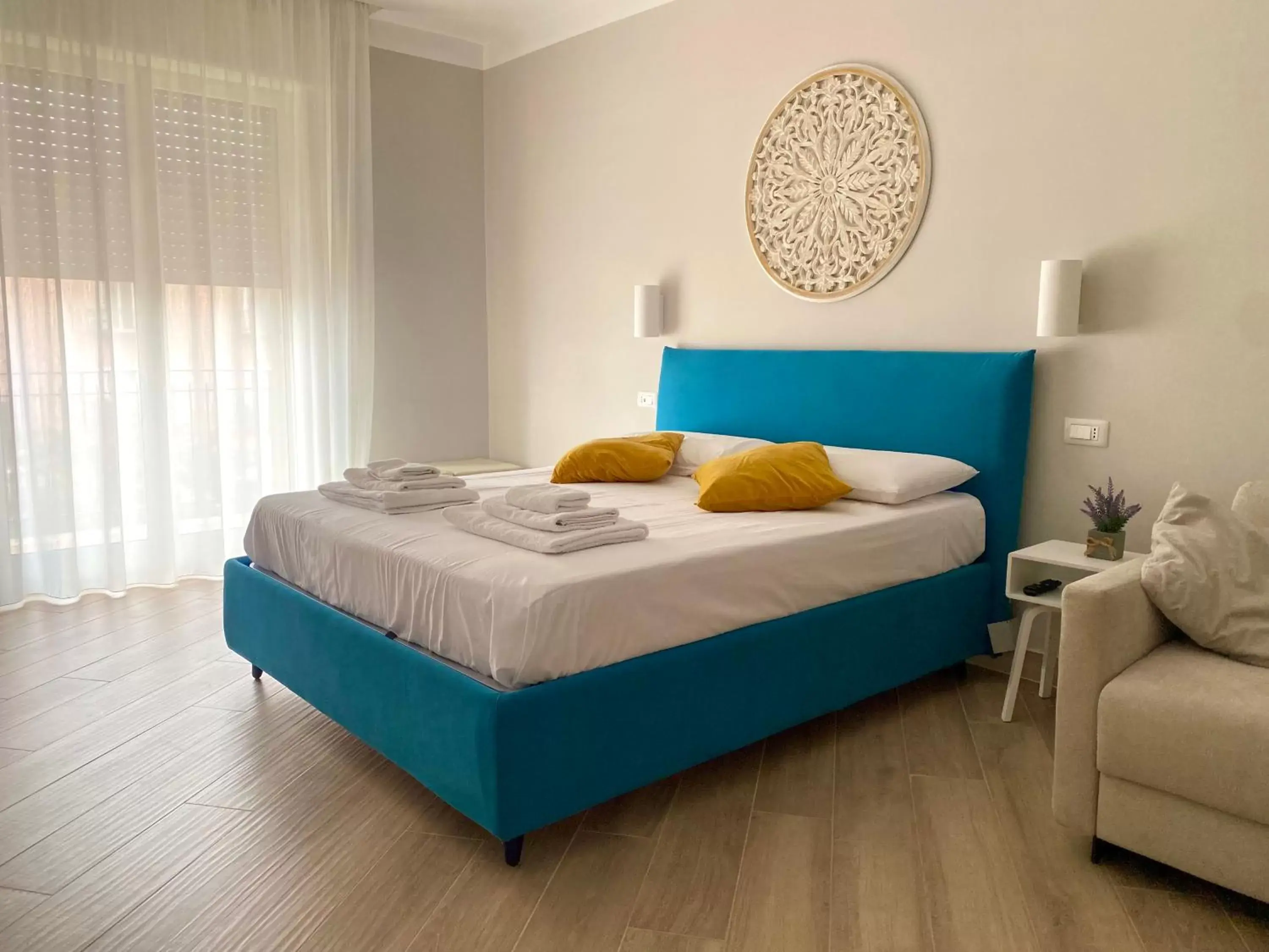 Triple Room with Private External Bathroom in Luna Nuova Suites Triple Room with Private External Bathroom in Luna Nuova Suites