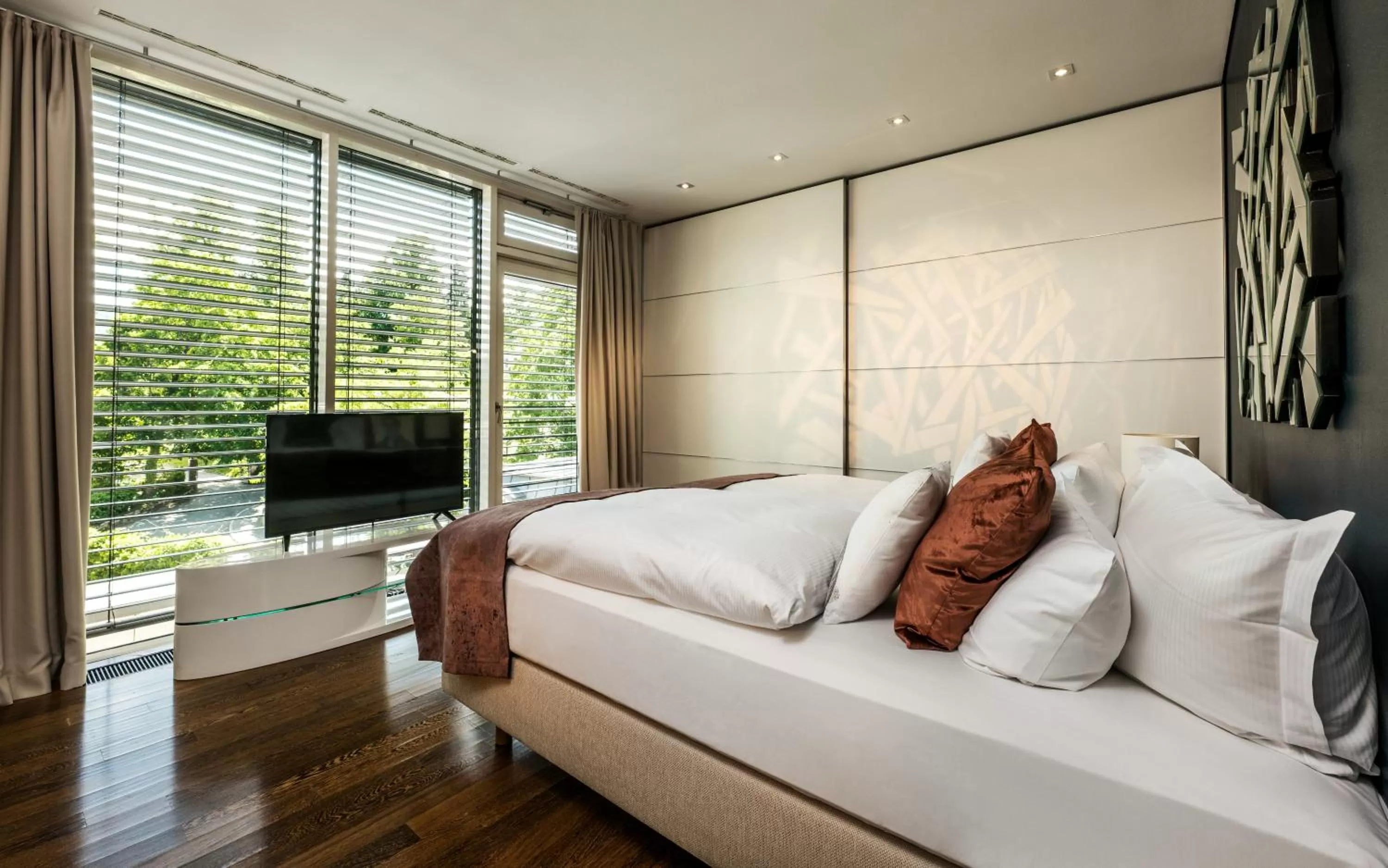 Bed in Maison Messmer - ein Mitglied der Hommage Luxury Hotels Collection