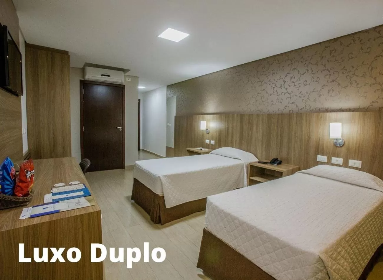 Bed in Foz Presidente Comfort Hotel