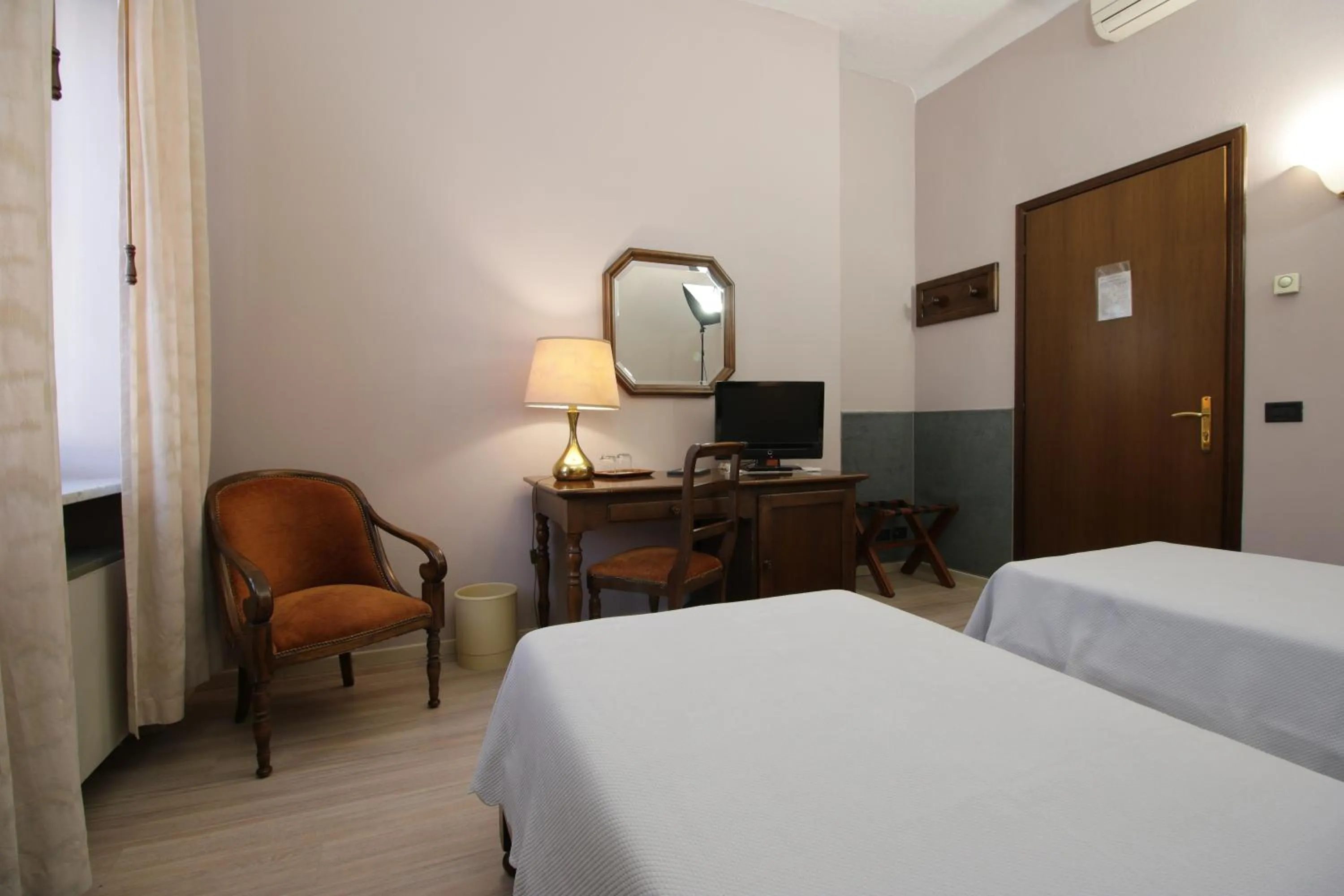 Photo of the whole room, Bed in Il Giardinetto