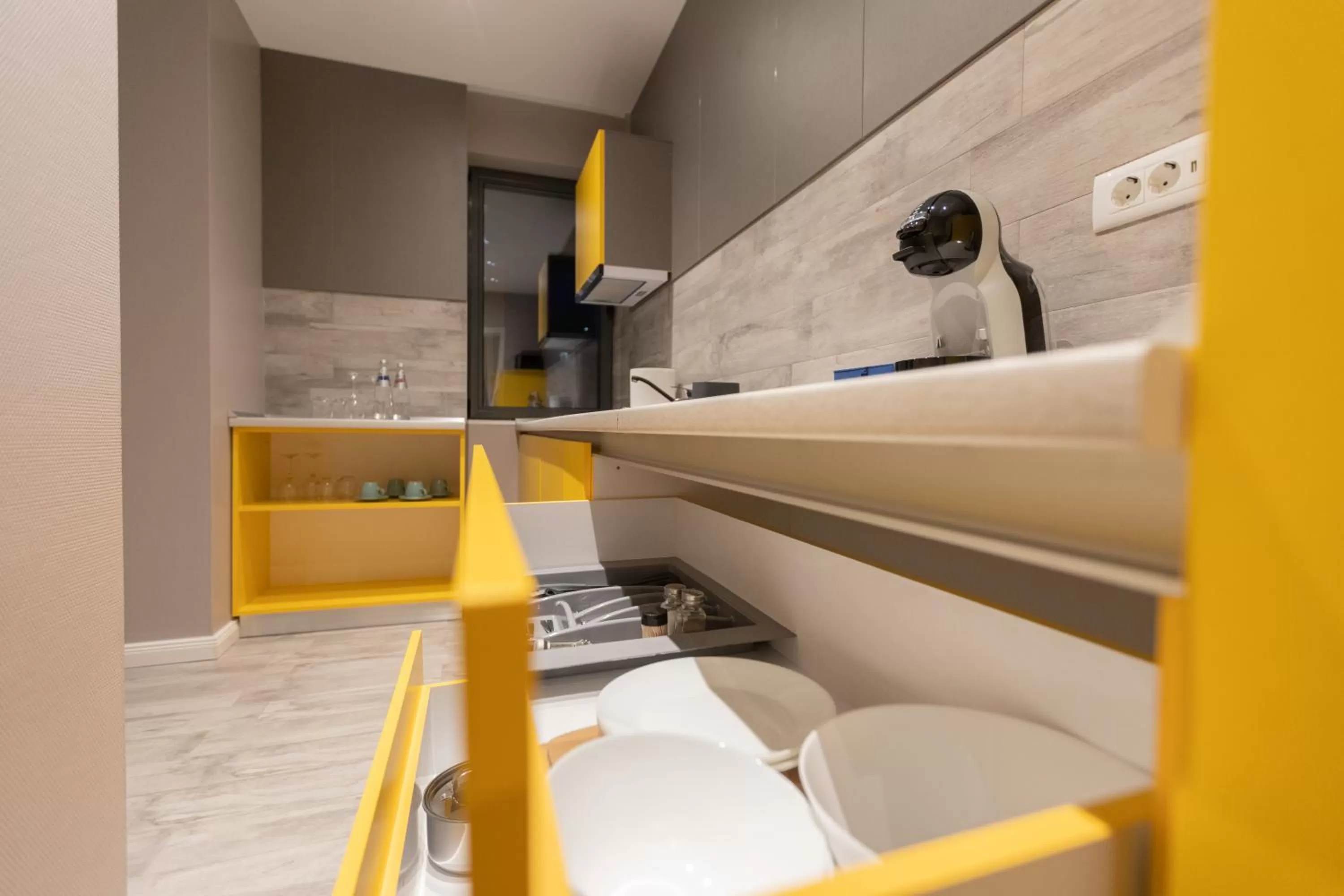 Kitchen or kitchenette in Omnia Apartments