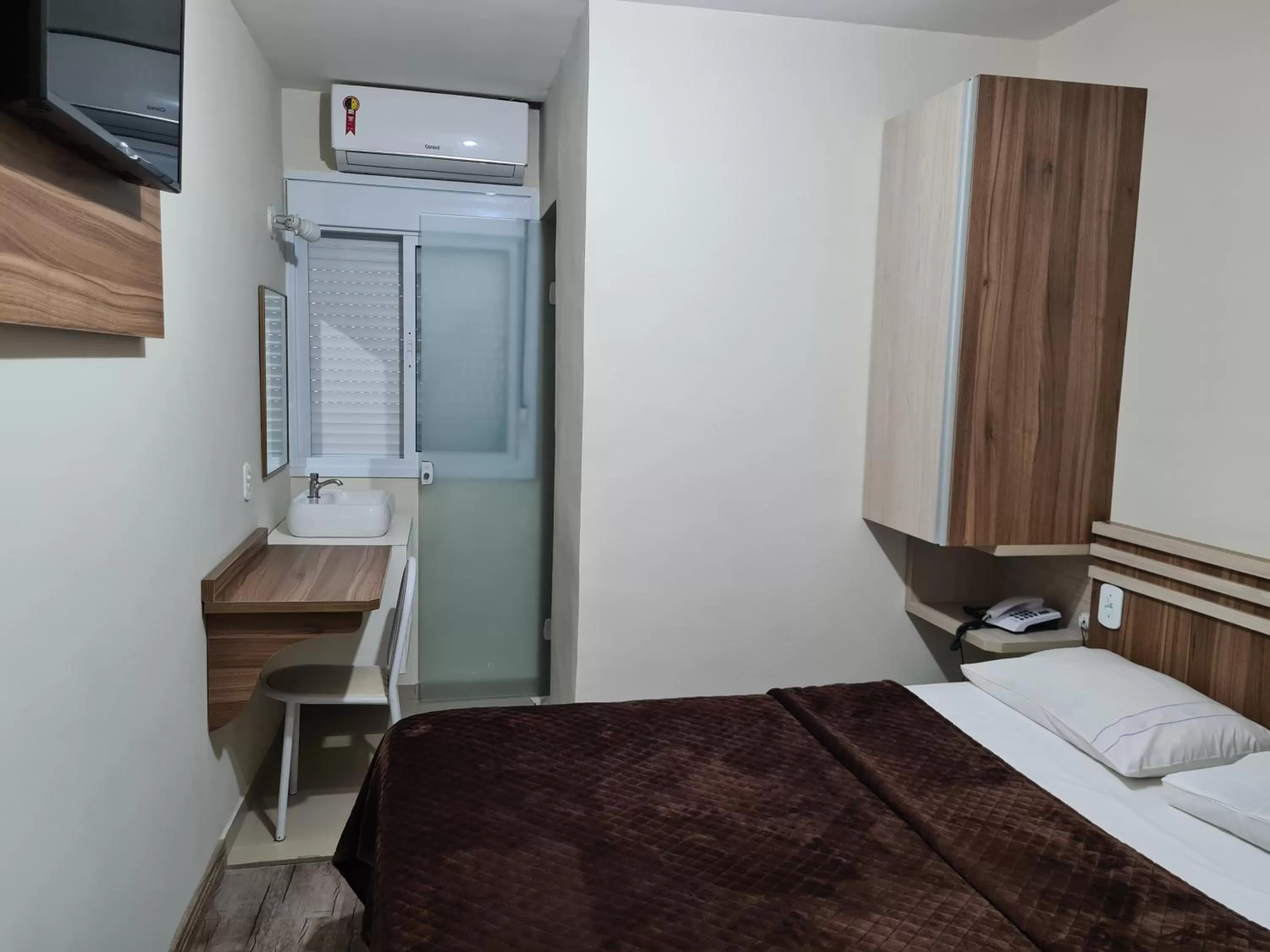 Bed in Bella Augusta Hotel