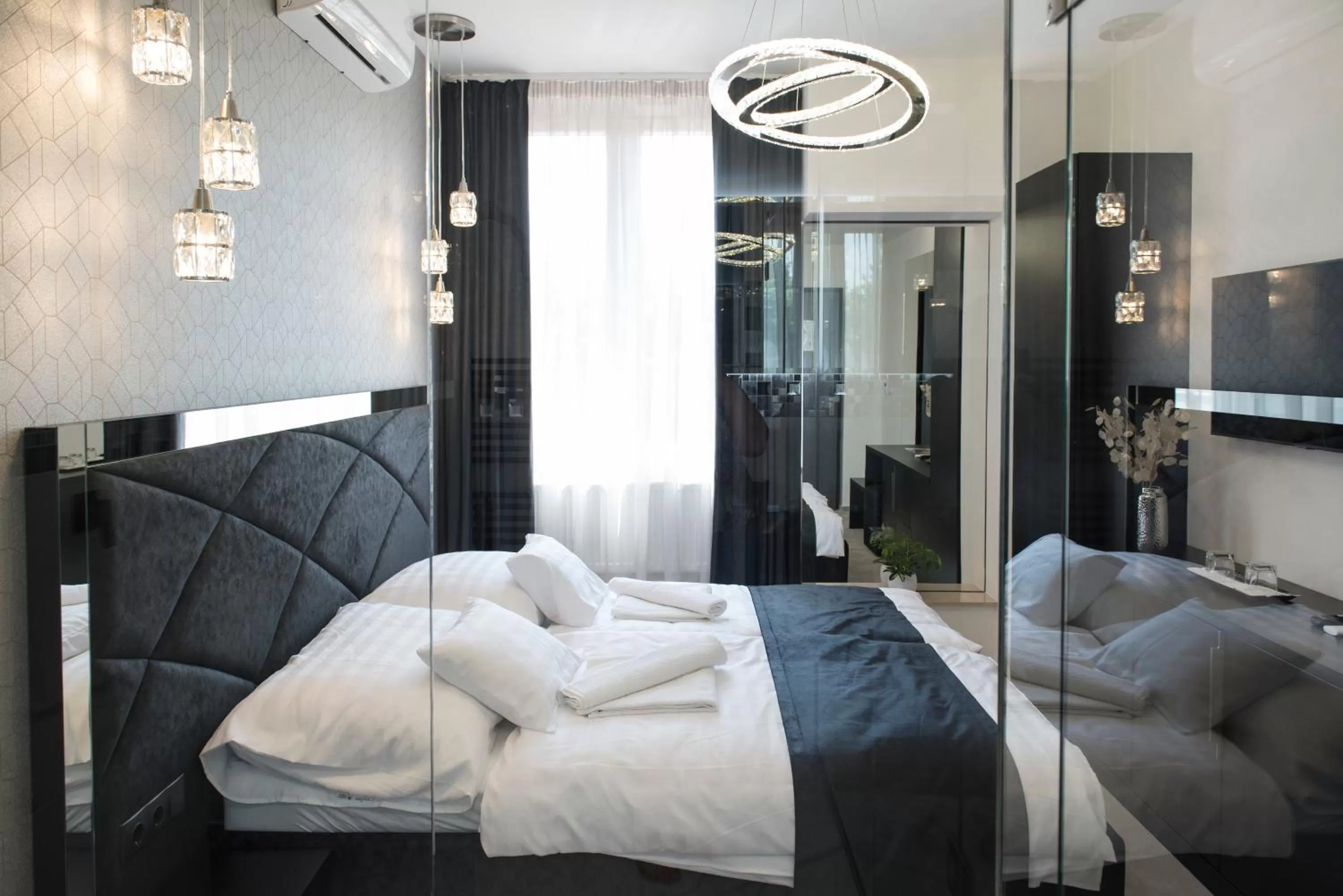 Photo of the whole room, Bed in Z Rooms Boutique