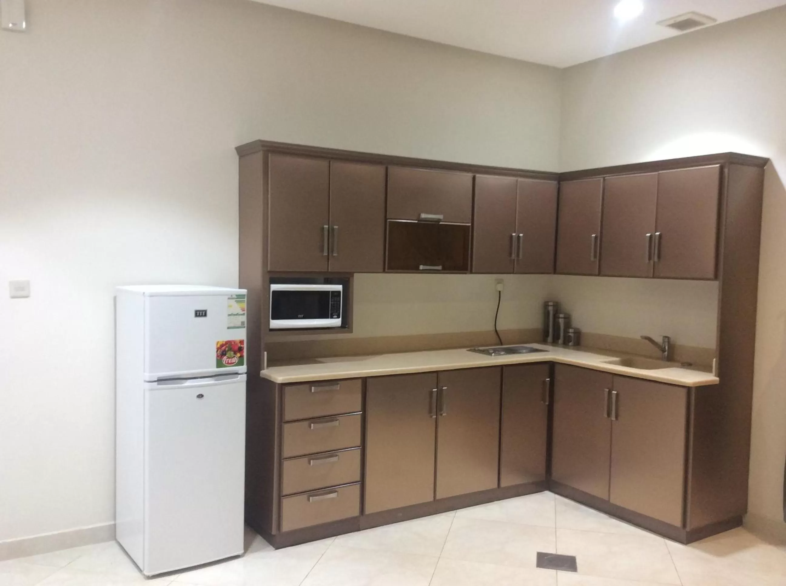 Kitchen or kitchenette in Admire Apart' Hotel